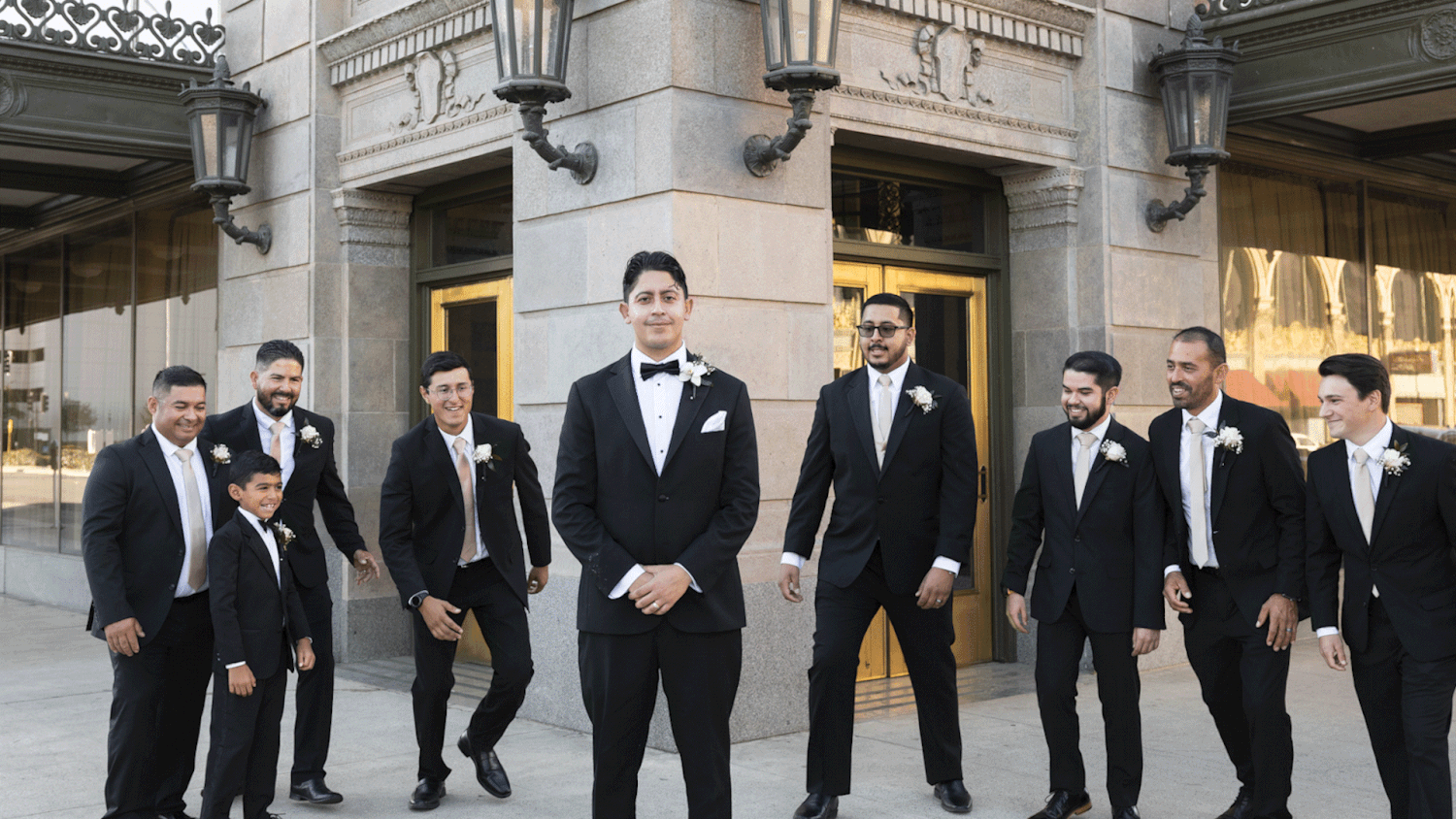 A gif of groomsmen interacting with the groom.