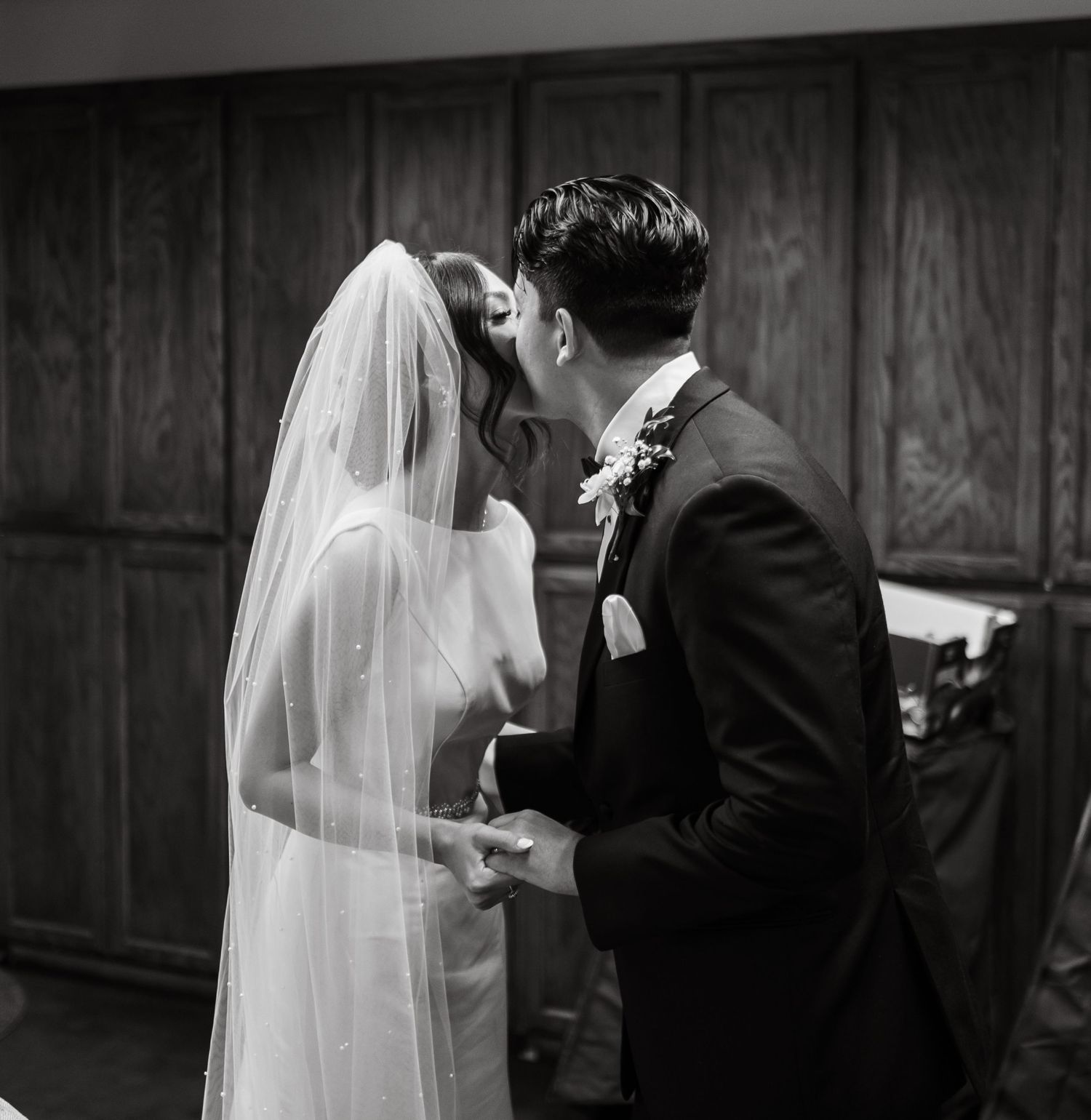 Black and white photo series capturing intimate wedding ceremony moments with a bride in white.
