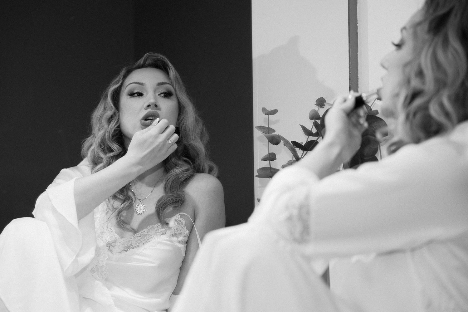 Black and white photo series showing candid moments in a bathroom setting.