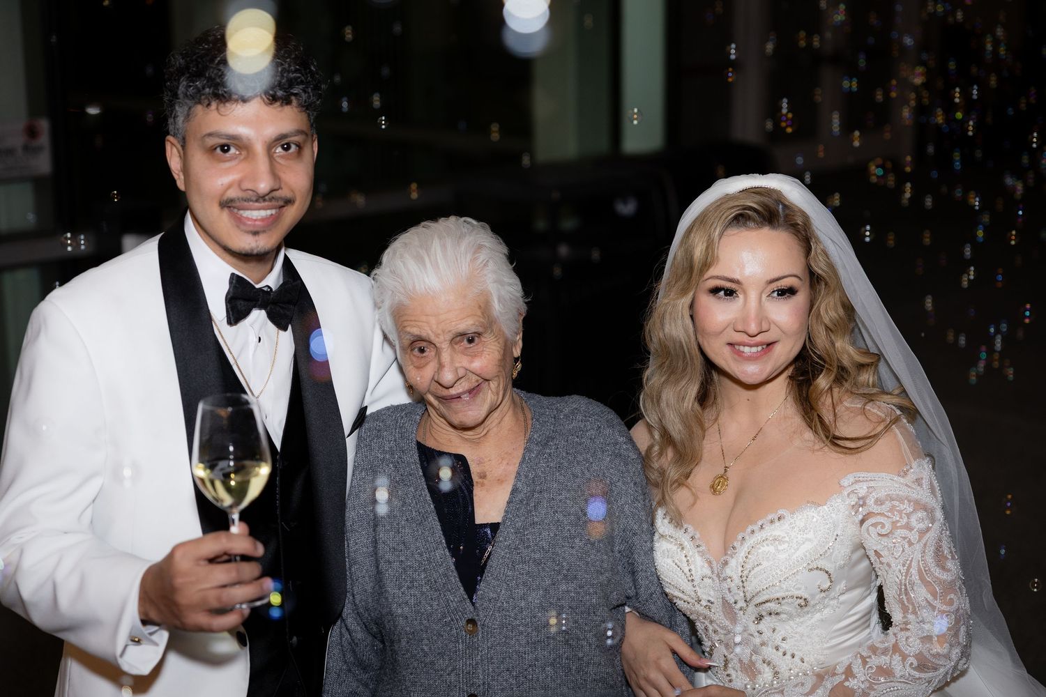 A formal evening celebration with guests in black tie attire.