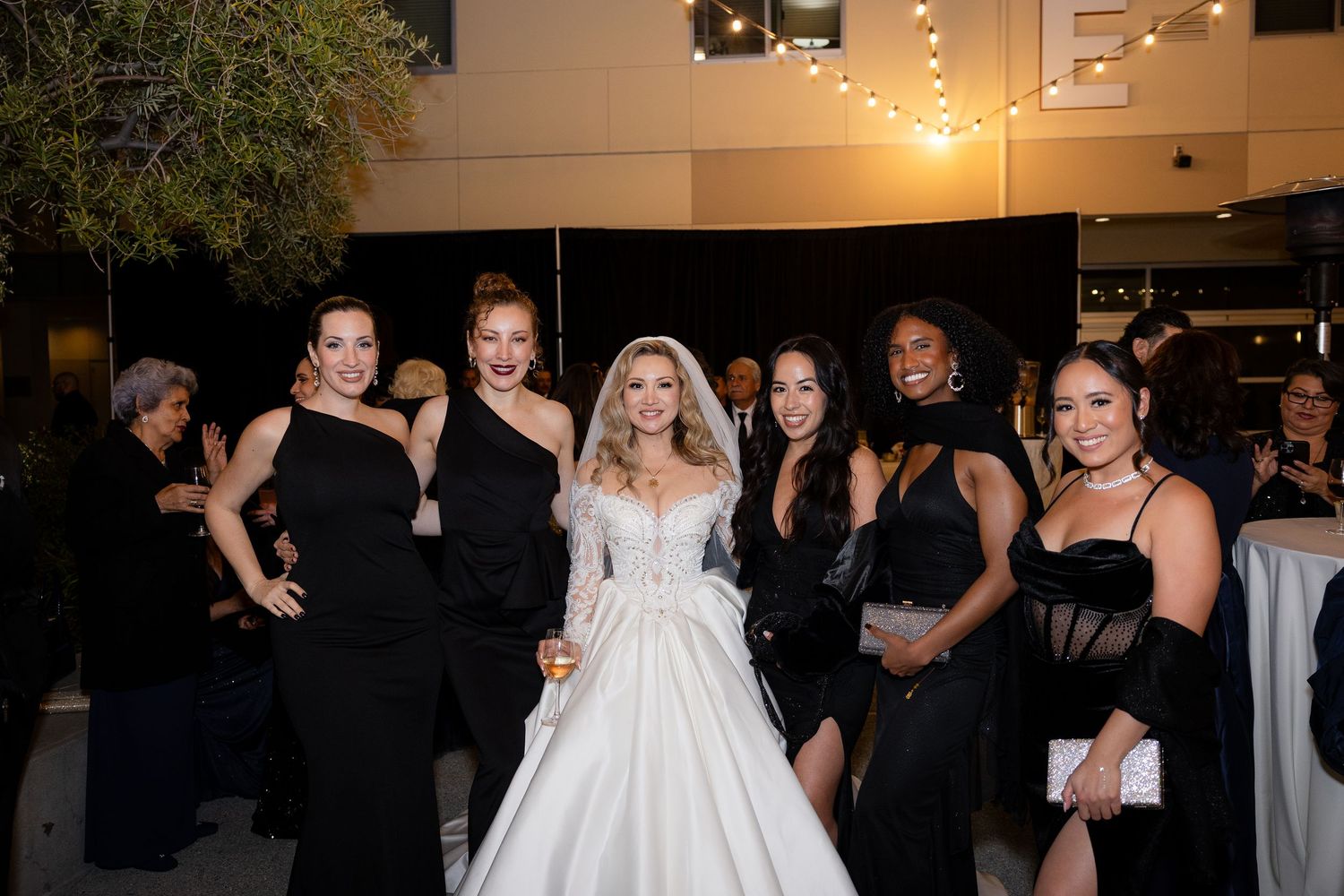 An elegant wedding reception venue with formal decorations and lighting.
