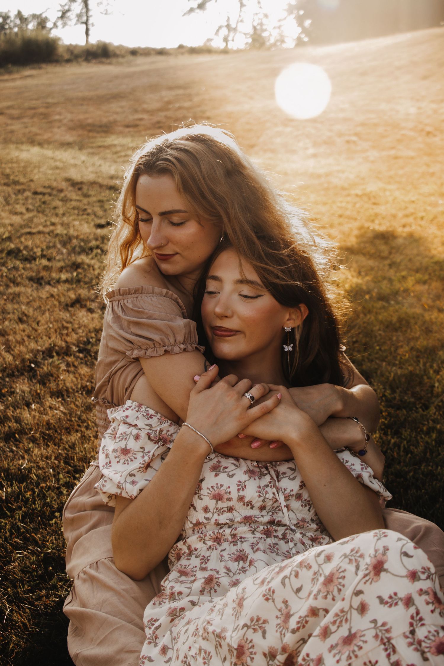 Romantic sunset photoshoot featuring tender embraces in golden hour lighting.