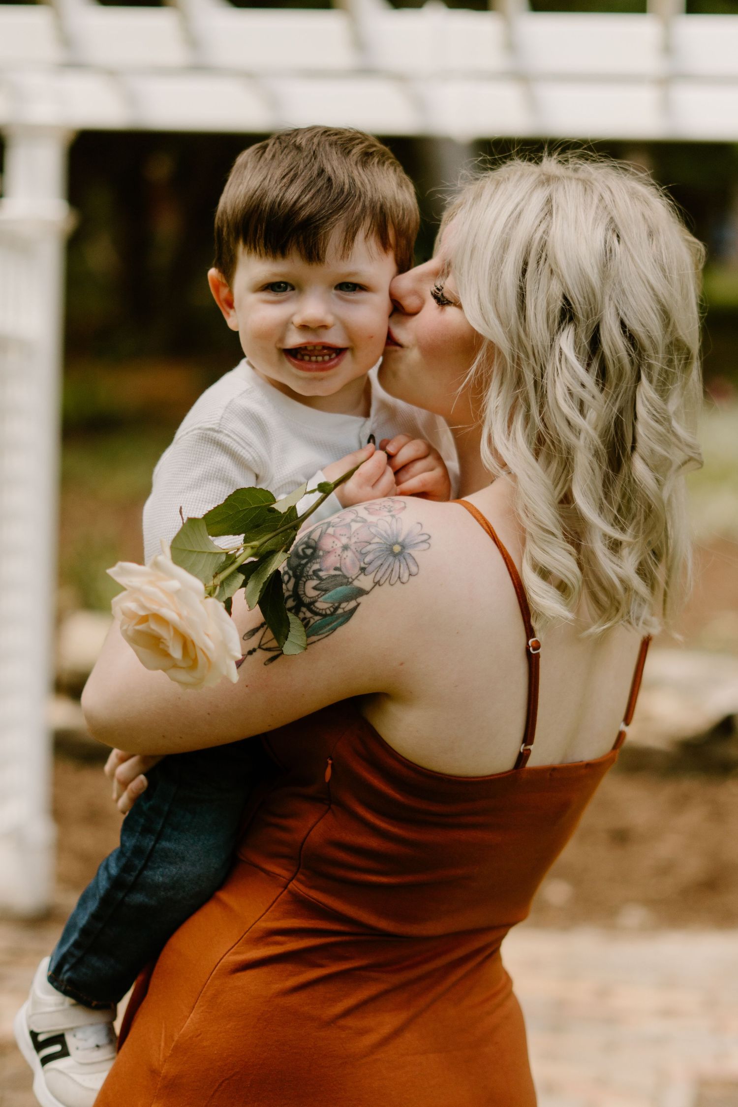 A mama embraces her sweet son