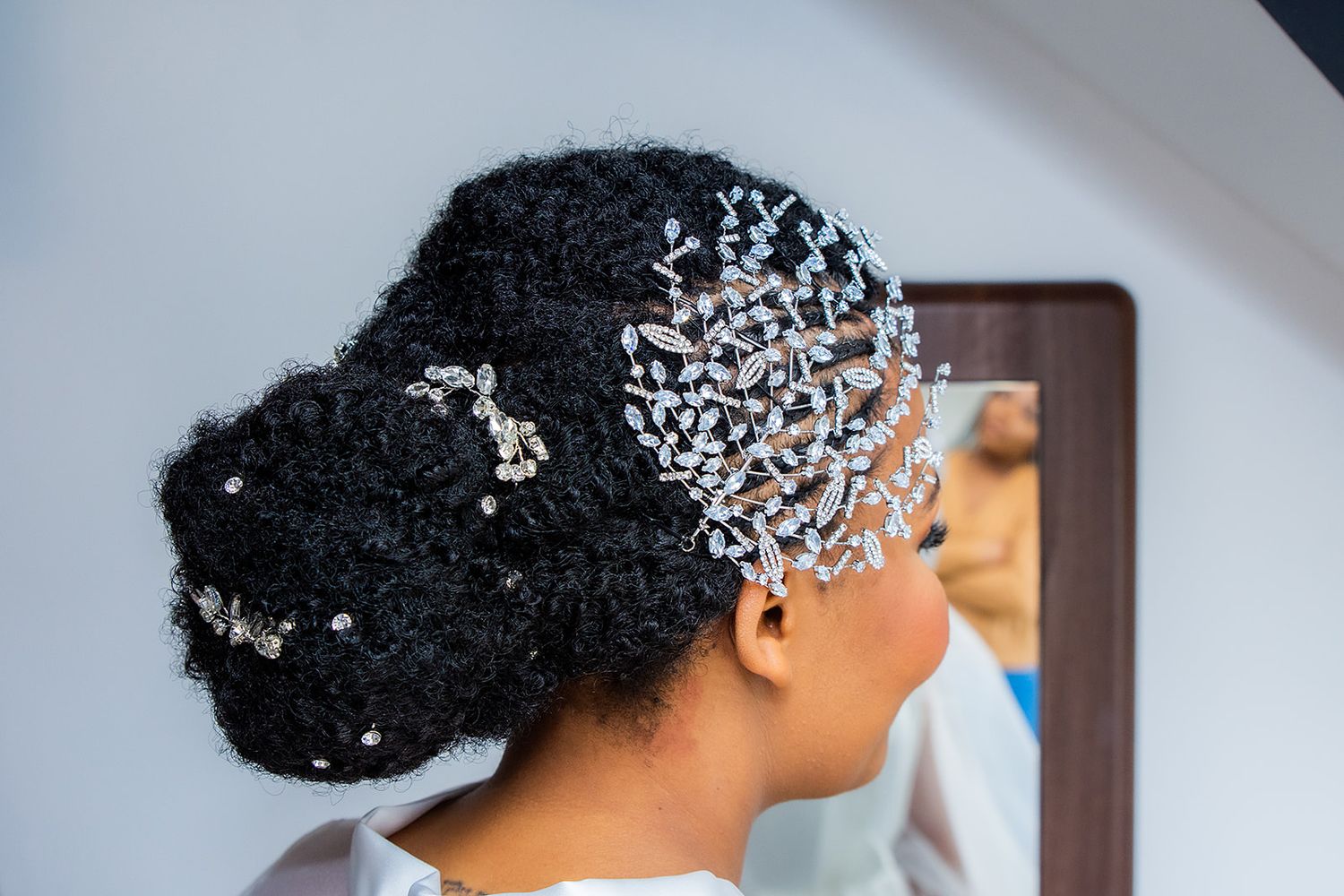 Close-up shots of bridal hair accessories and jewelry details.