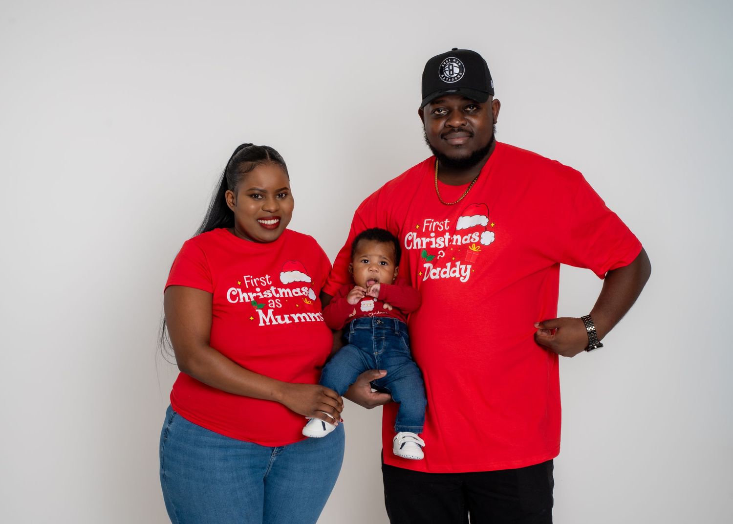 Four photos of people wearing matching red t-shirts with text posing together against a white background.