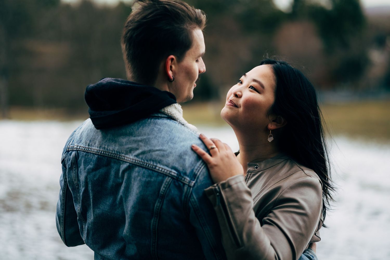 Romantic outdoor couple photography session with natural candid moments.