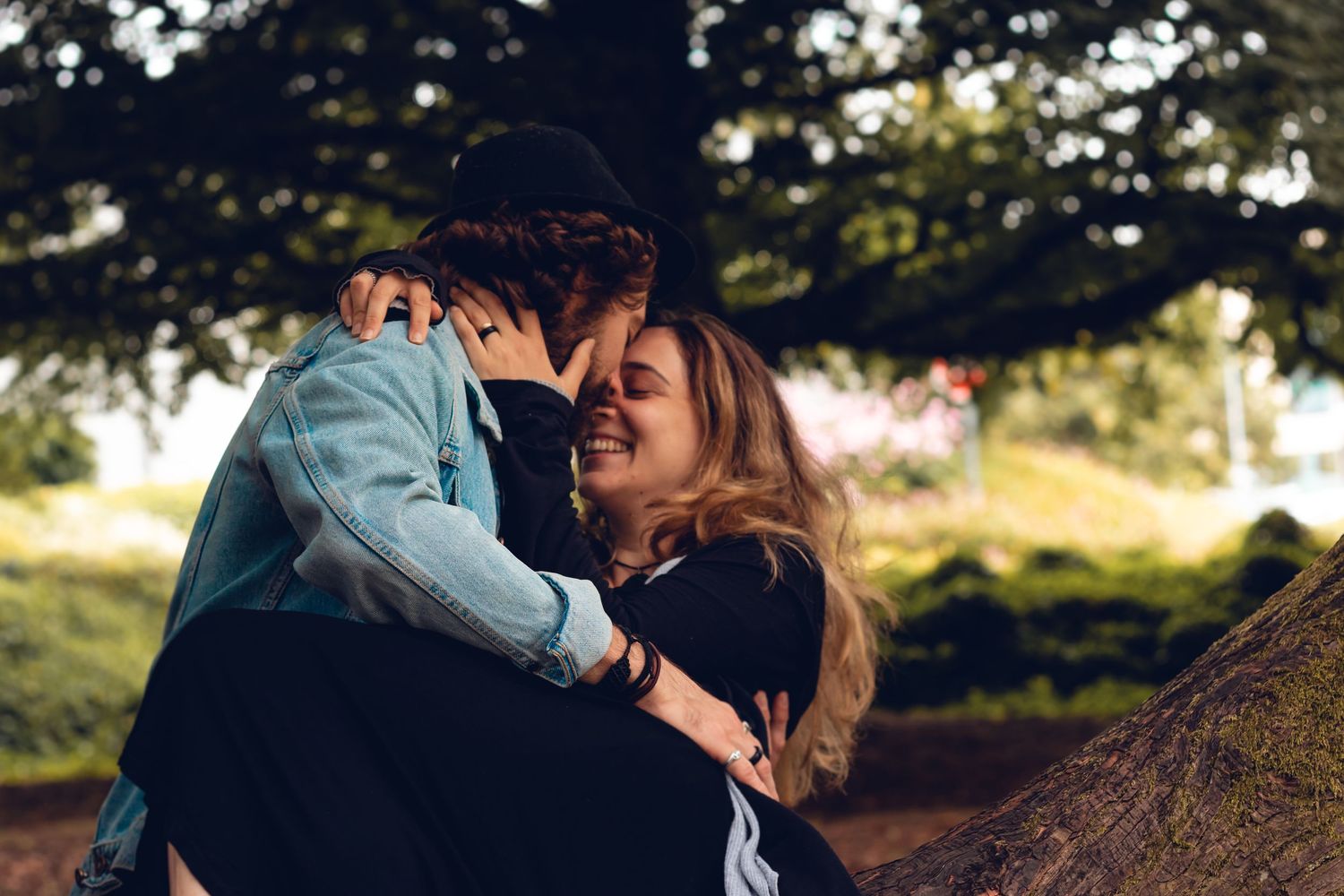 Romantic couple photographed outdoors in Galway with scenic background