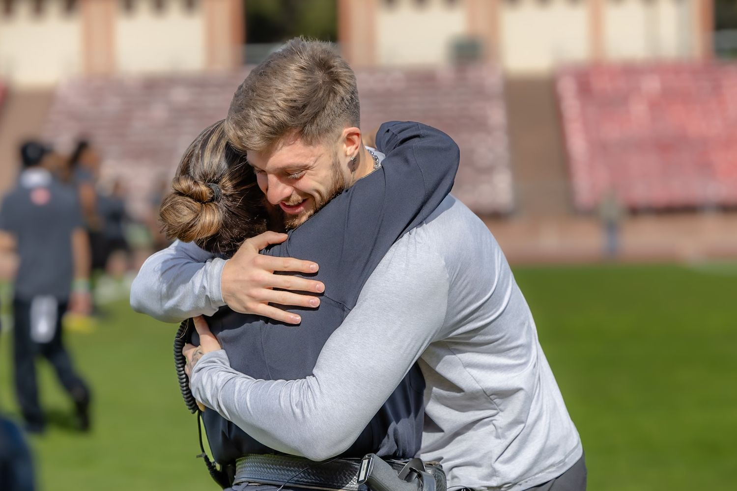Ricky Pearsall hugs the police officer who saved his life