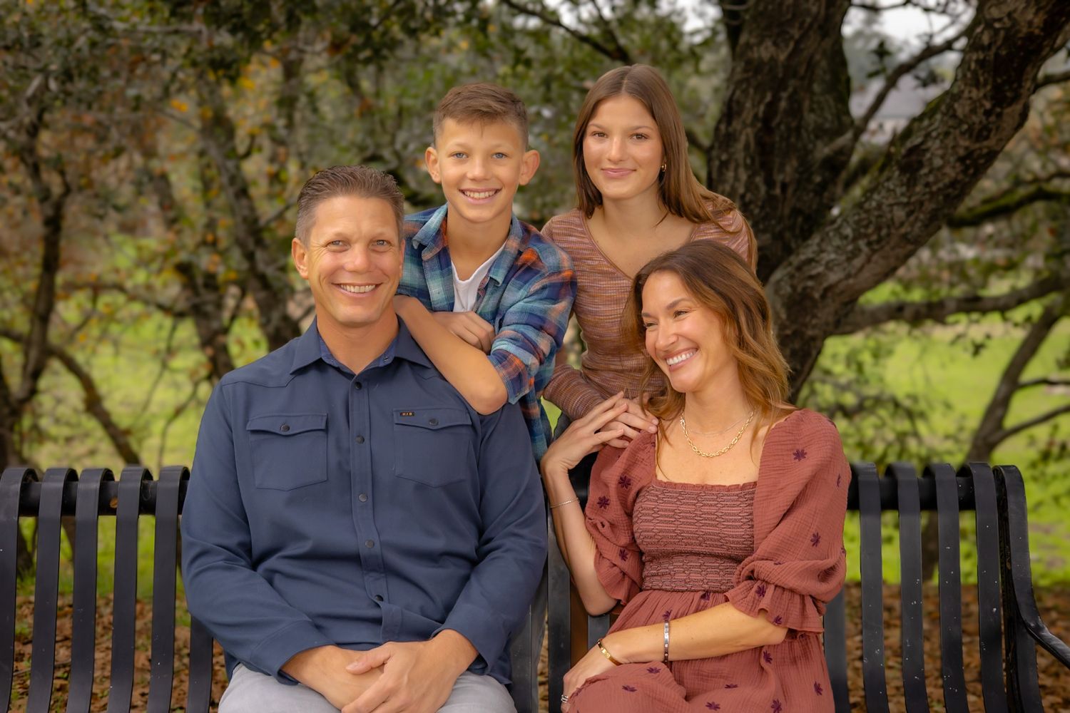 Beautiful Petaluma family enjoy time on a bench in portrait by Sonoma county photographer smc shots