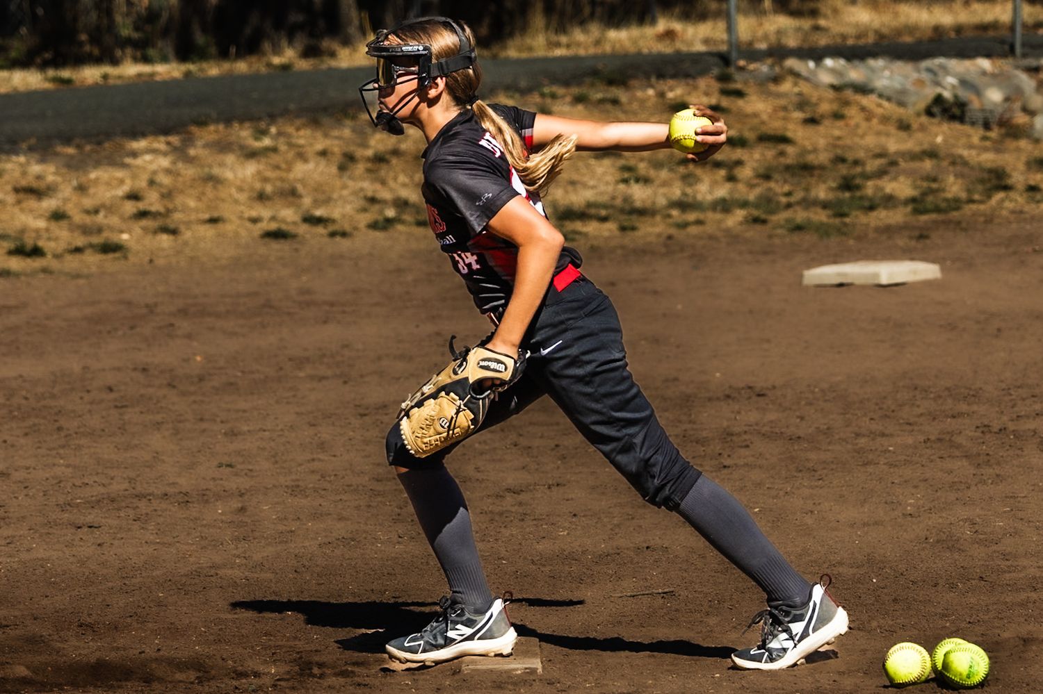 Softball girl arm back in action sports photography Sonoma county by SMC shots