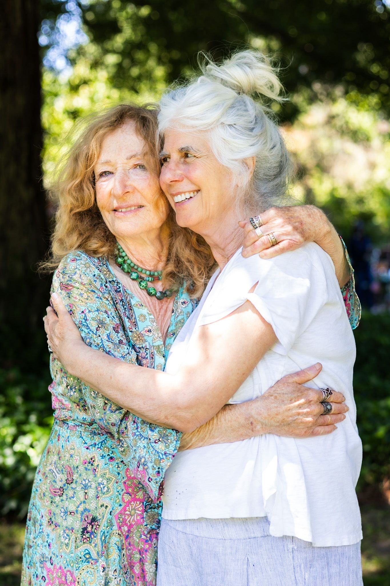 A warm embrace under the redwoods in a picture captured by smc shots
