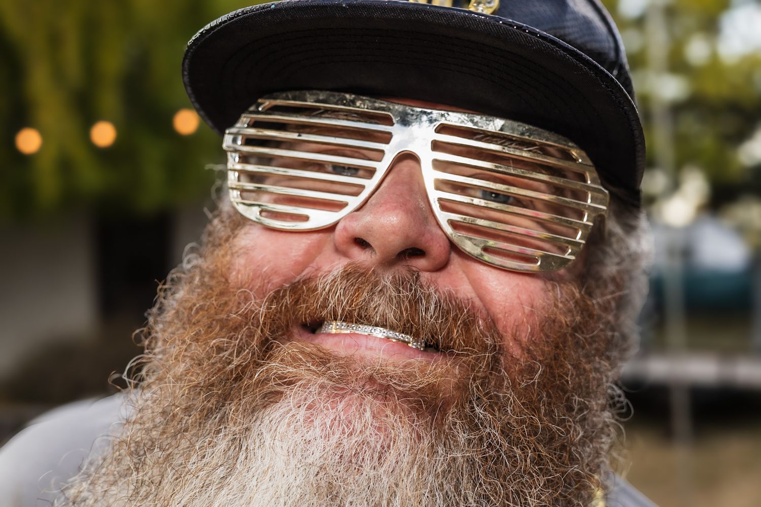 Happy smiling guy in glasses enjoying the day in a photo by smc shots in Santa Rosa
