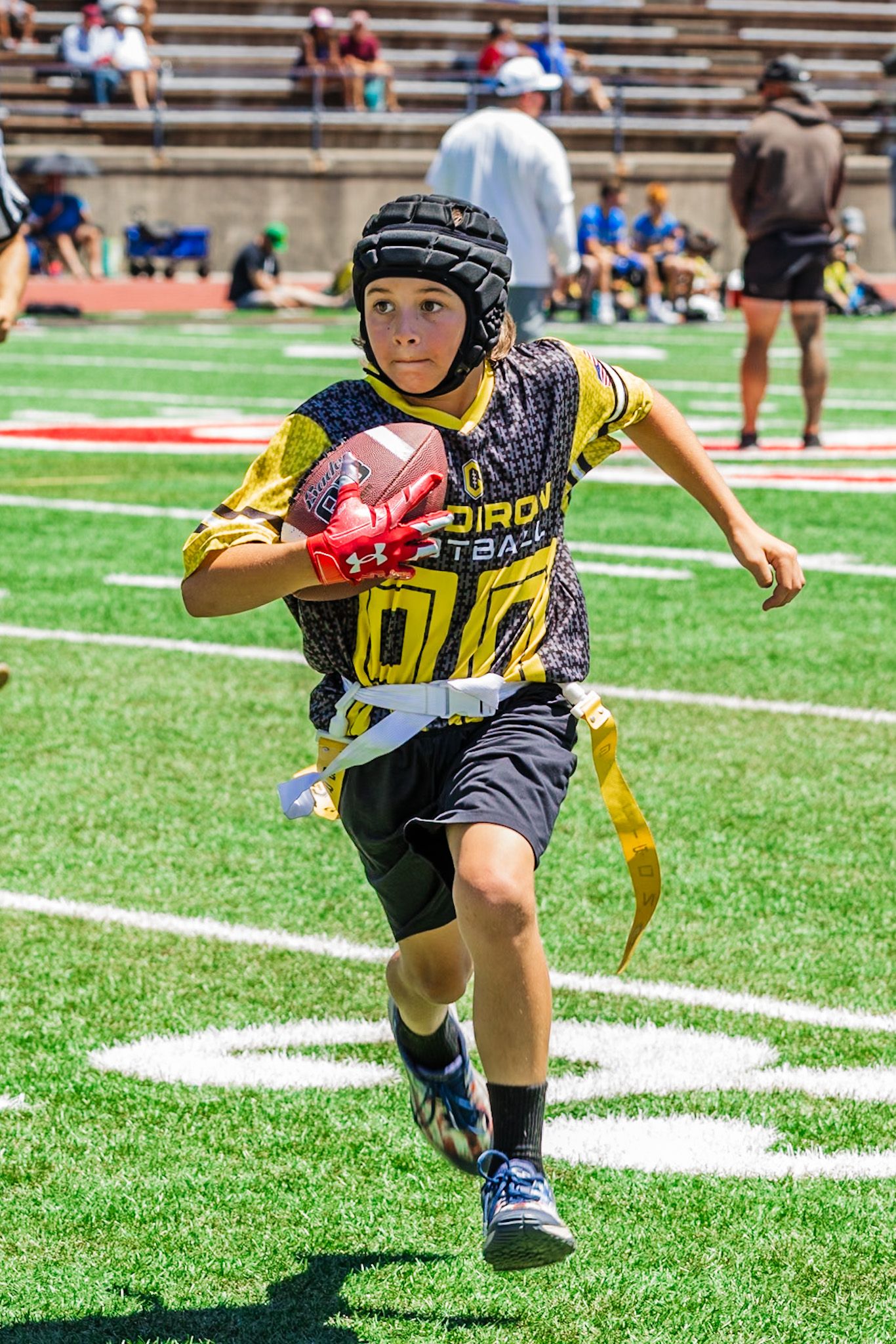 Flag Football running back runs the ball in sports action shot by smc shots of Sonoma county
