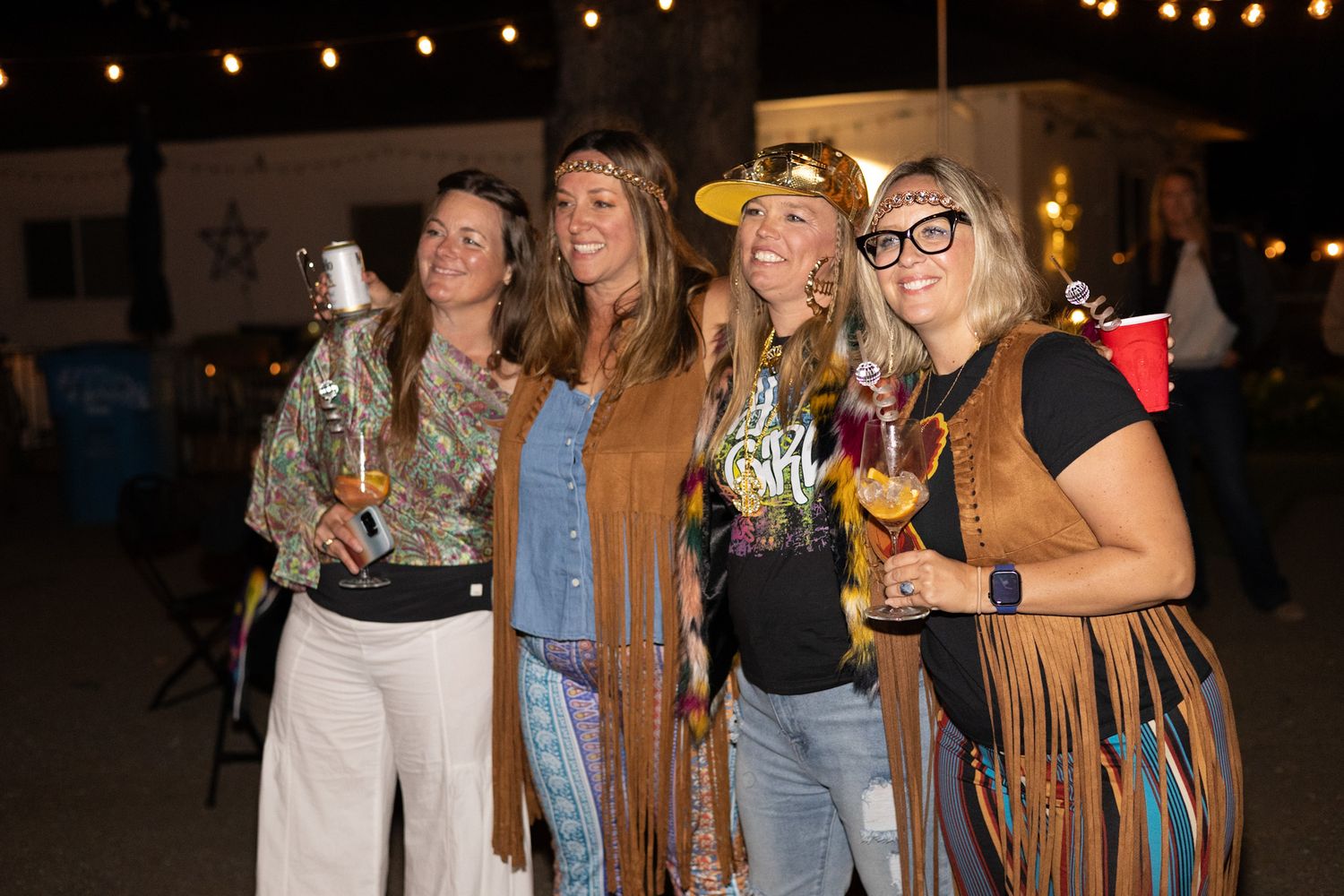 70’s themed party goers dancing for the birthday celebration by smc shots