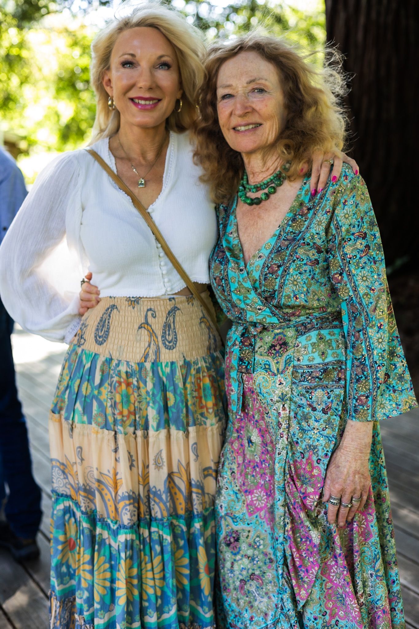 The birthday girl enjoying a hug with a beautiful friend by smc shots