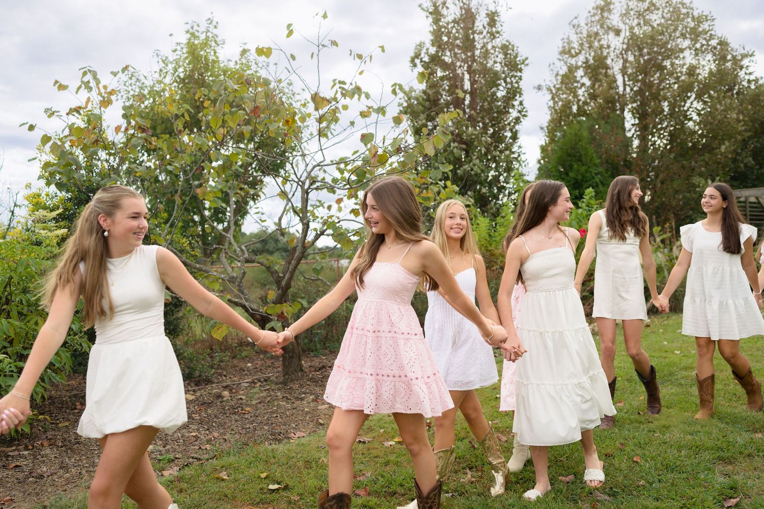 Teen girls laughing together during a birthday photo session