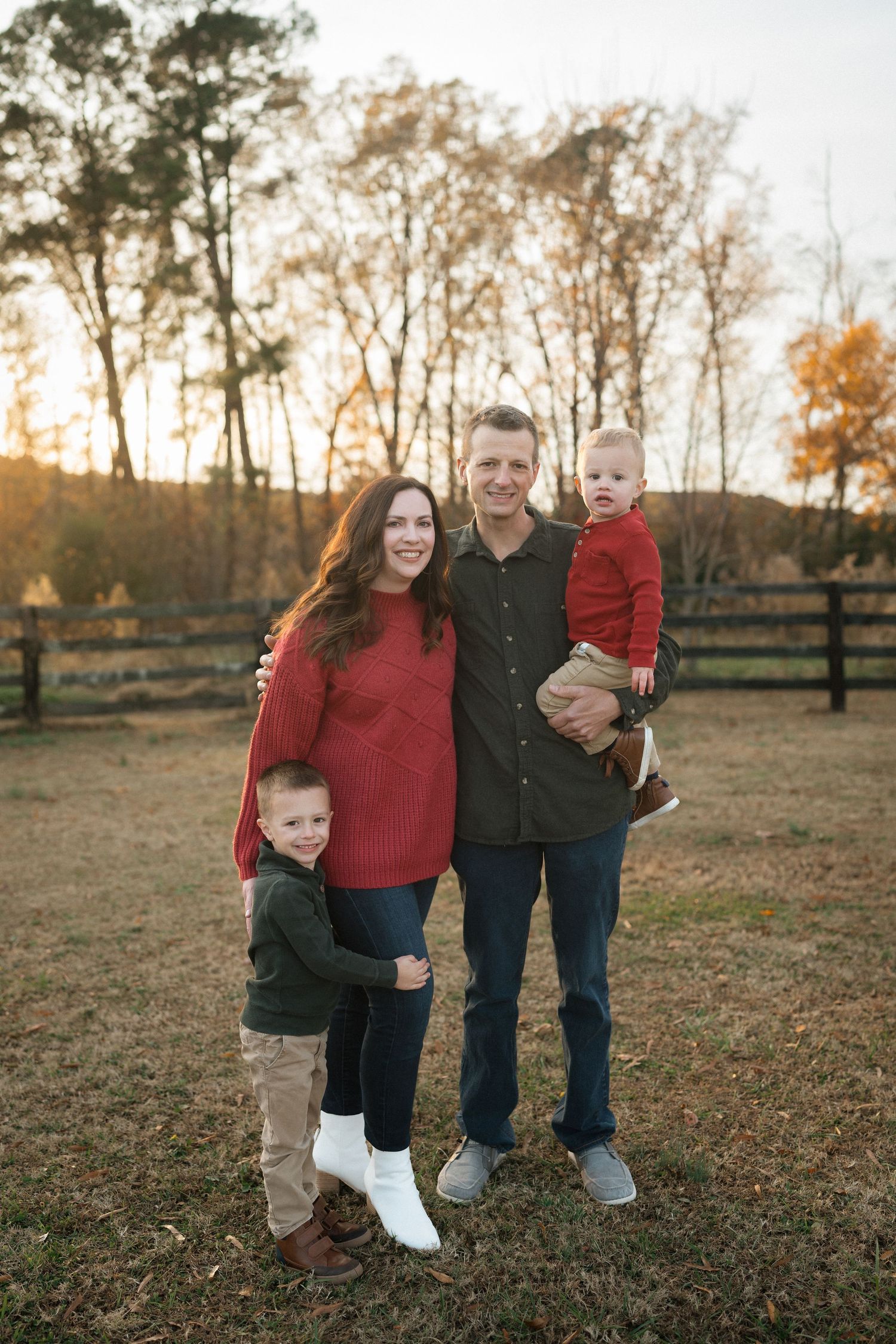Family portrait session outdoors at Sugg Farm in Holly Springs NC
