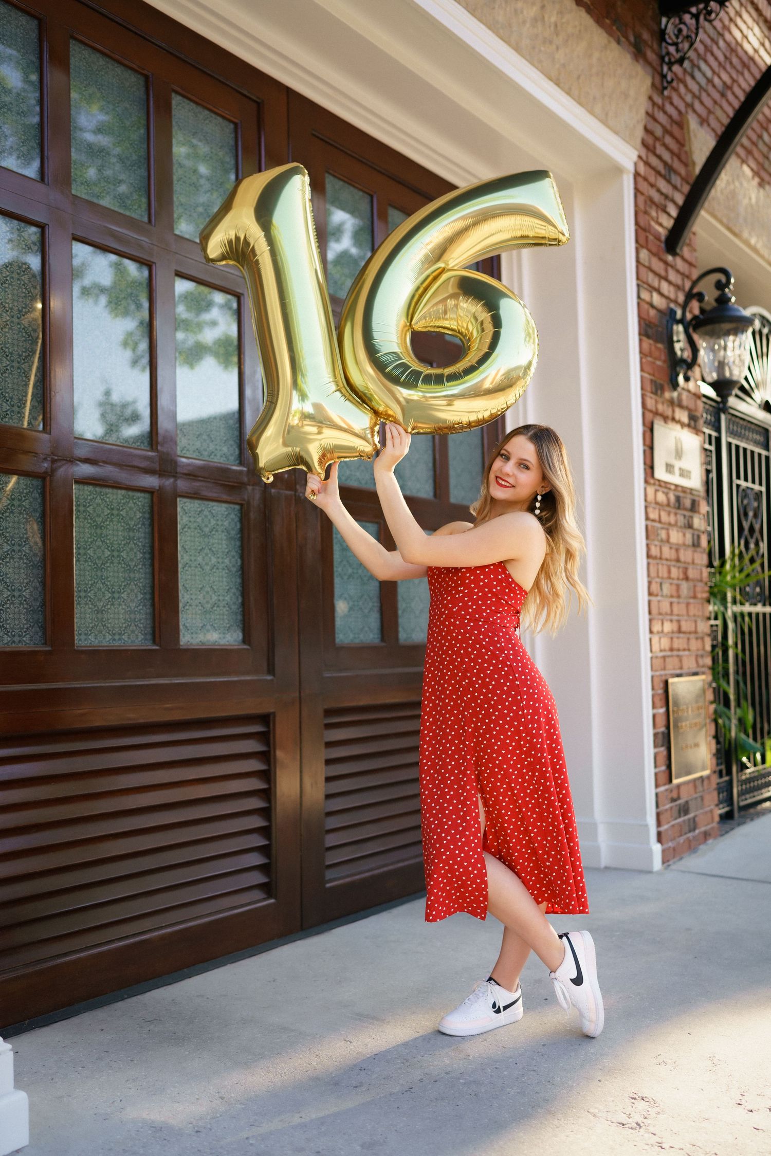 Sweet 16 milestone birthday portrait session in Downtown Wilmington NC