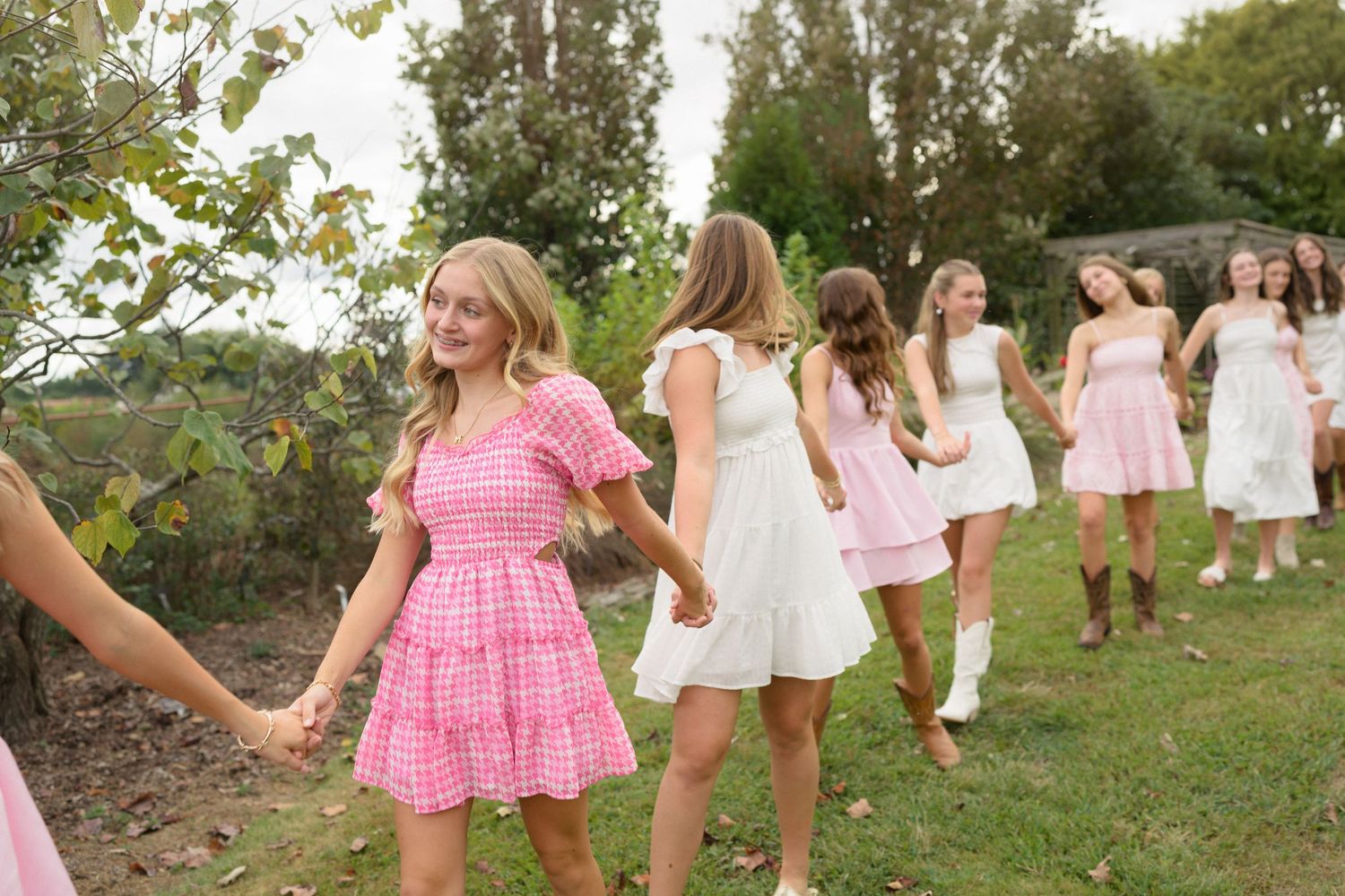 Friends walking together during a birthday session in Raleigh