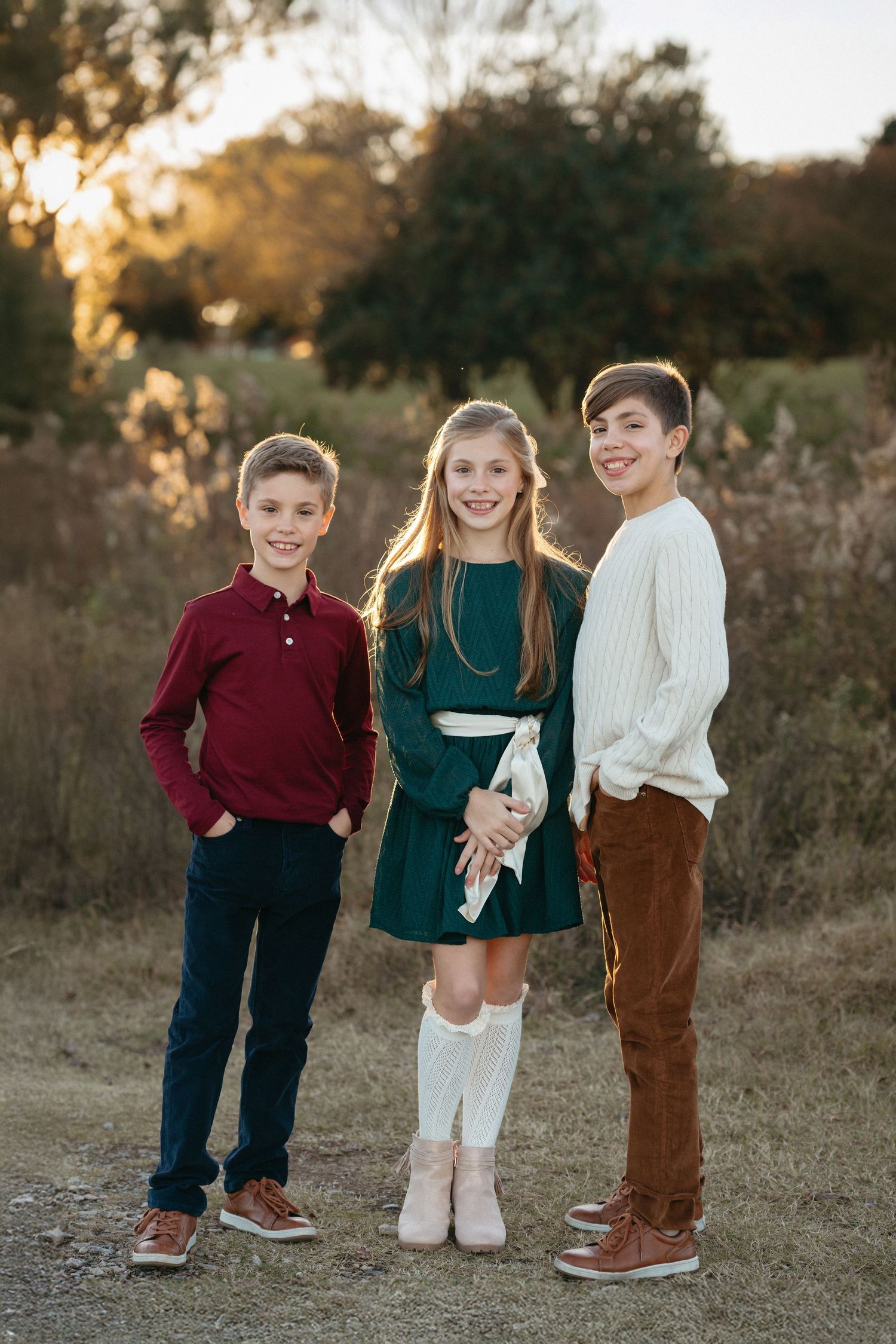 Family portraits at Dix Park Raleigh NC with natural light and greenery