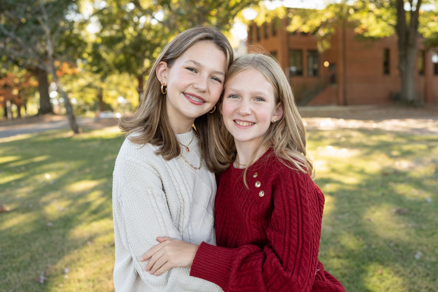 Family portraits at Dix Park Raleigh NC with natural light and greenery