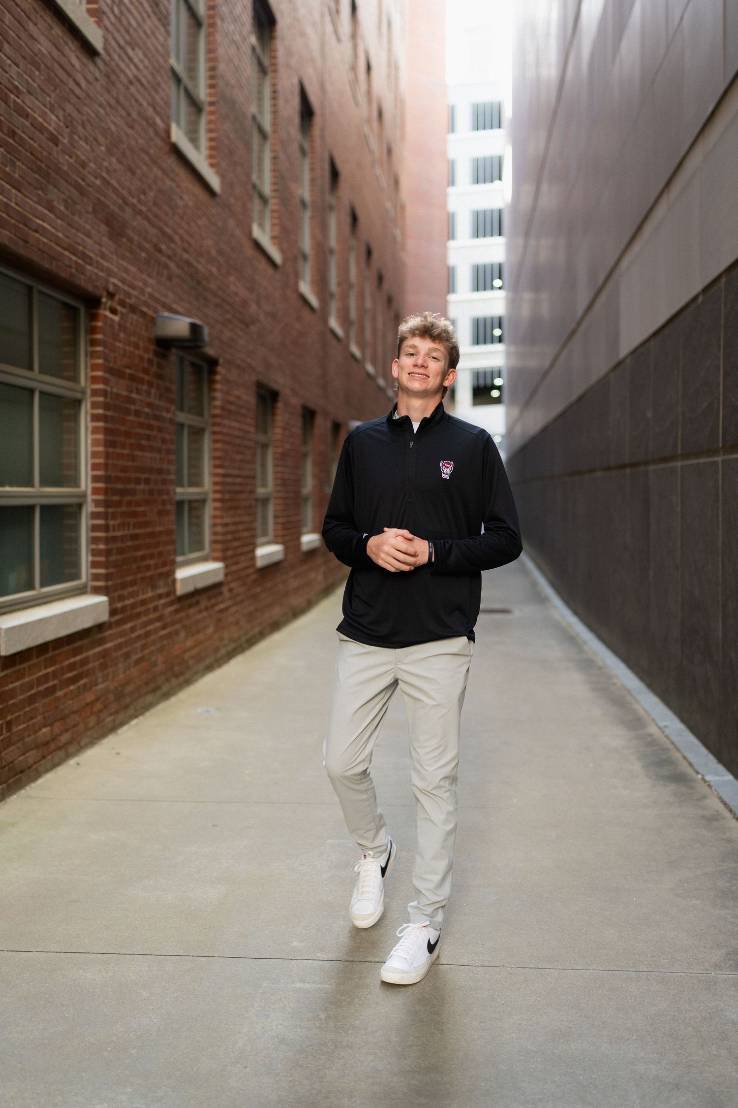 High school senior guy photographed in an urban setting in Raleigh, North Carolina