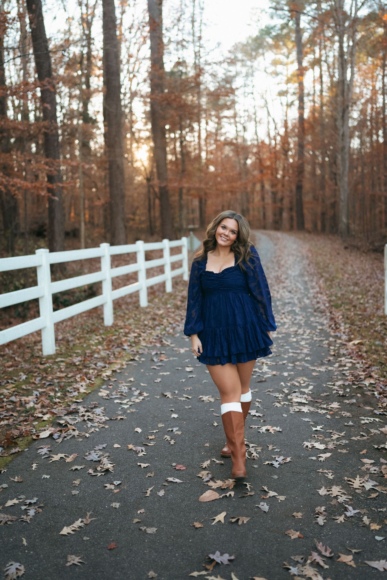 Teen girl portrait in navy dress during fall in Raleigh, NC