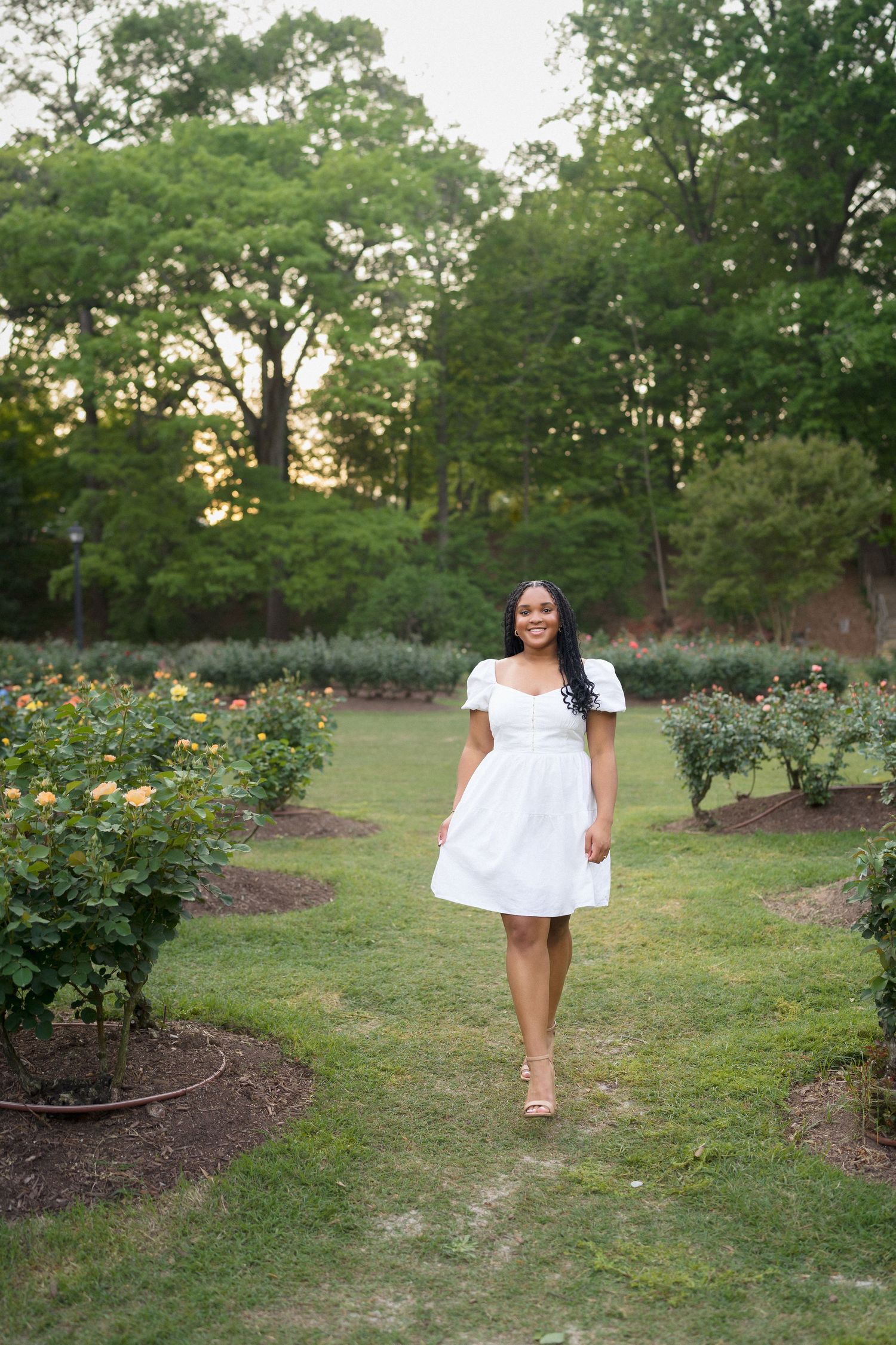 High school senior girl portrait in spring at Raleigh Rose Garden in Raleigh NC