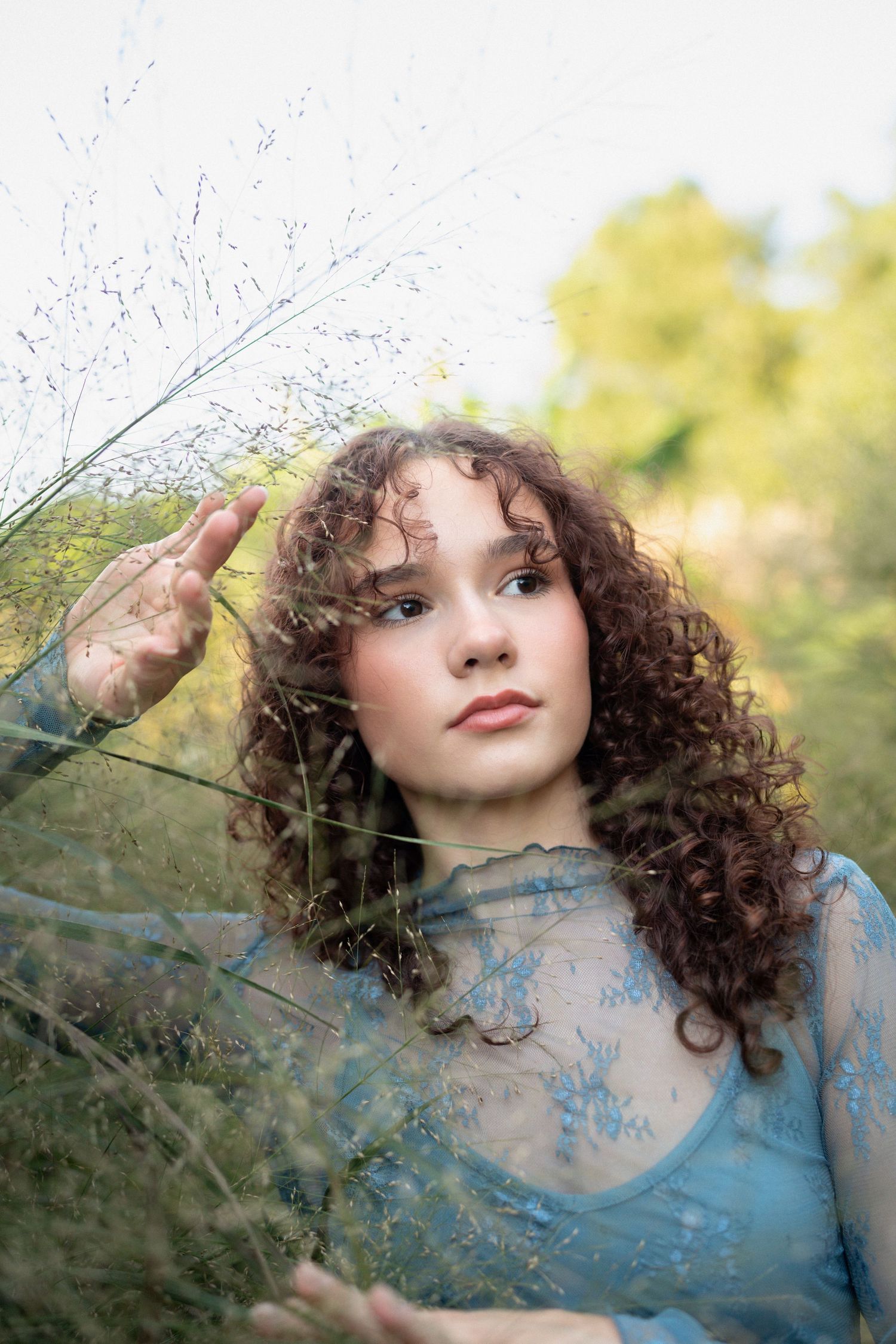 High school senior dancer posing at JC Raulston Arboretum in Raleigh, North Carolina.