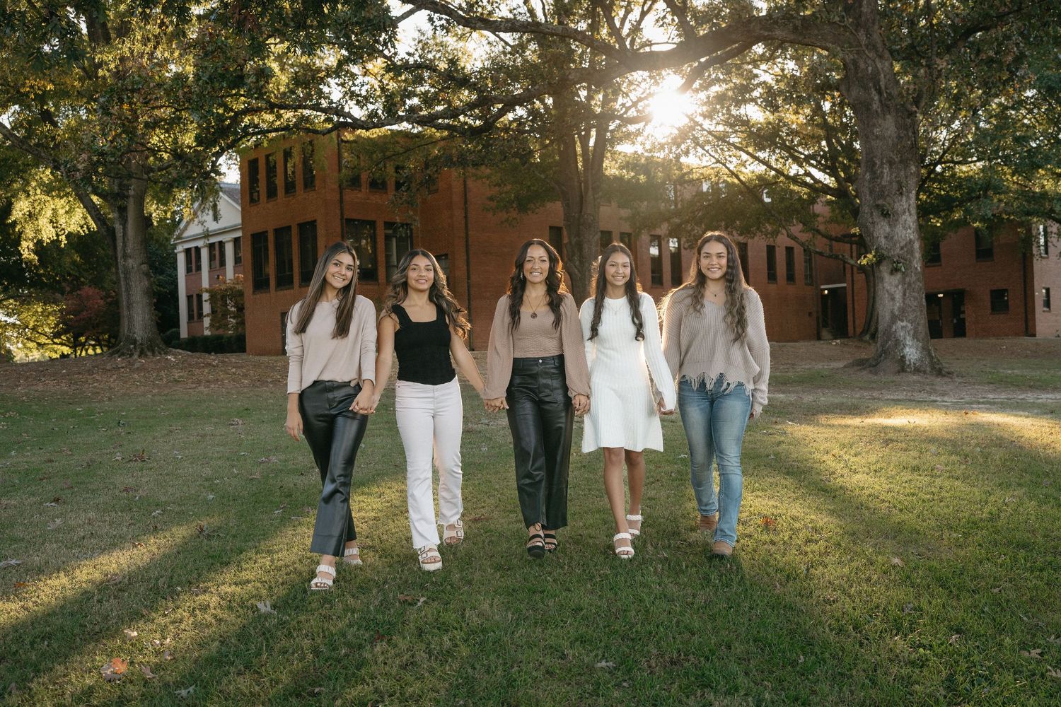 Family portraits at Dix Park Raleigh NC with natural light and greenery