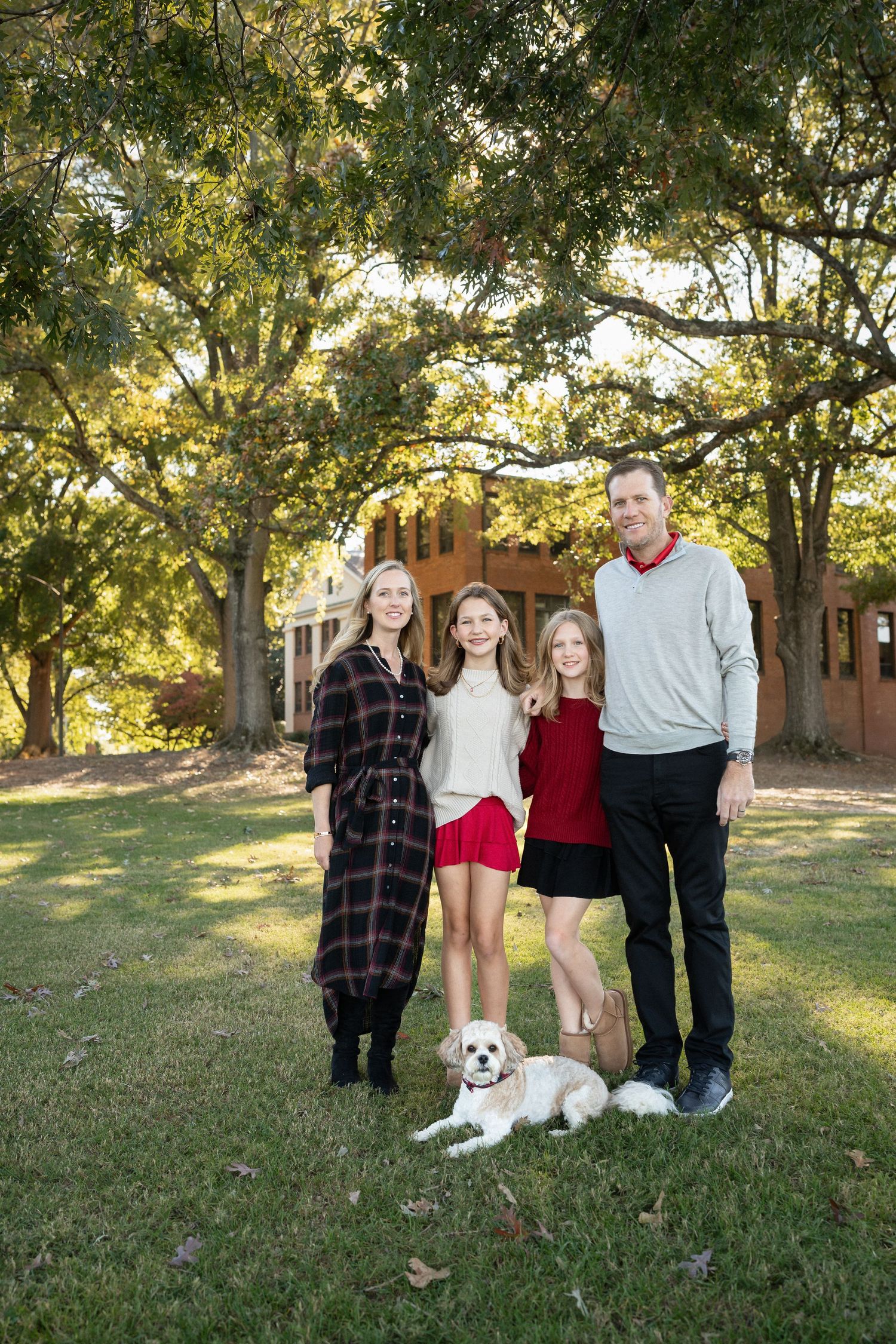 Family portraits at Dix Park Raleigh NC with natural light and greenery