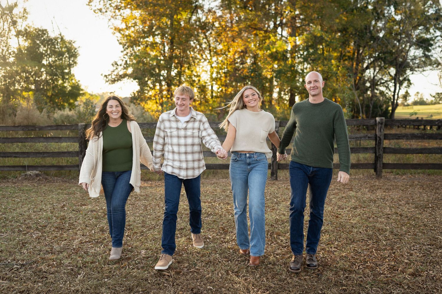 Family portrait session outdoors at Sugg Farm in Holly Springs NC