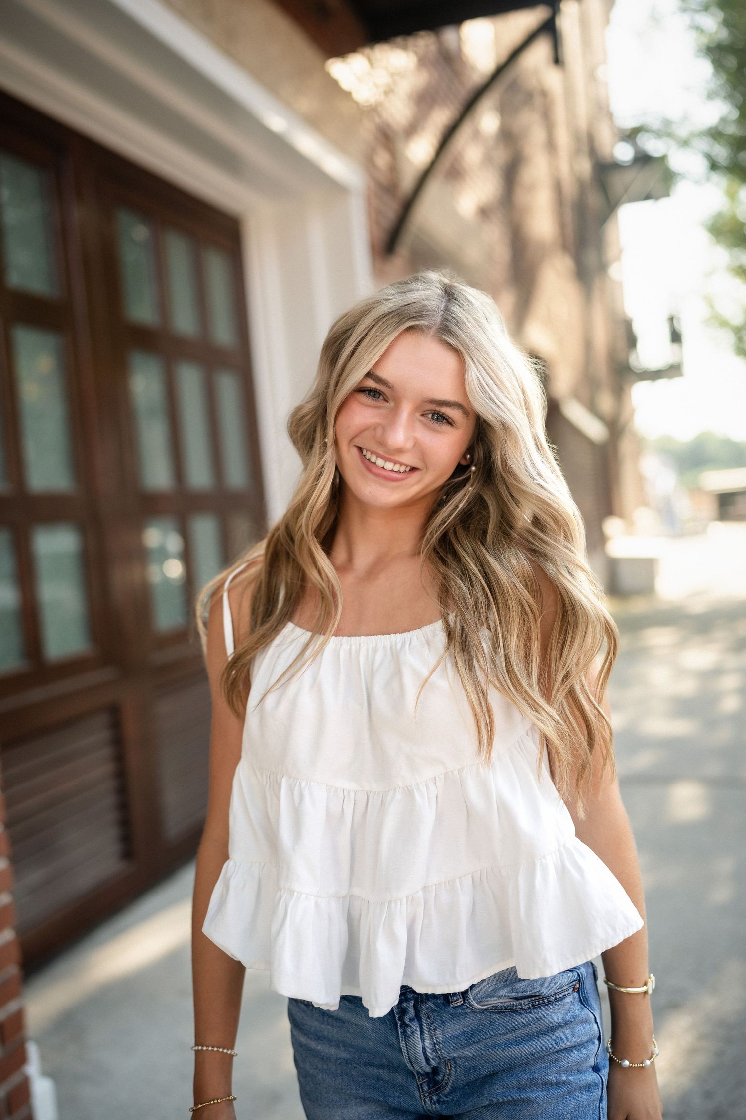 Close-up portrait of a high school senior girl in downtown Wilmington, North Carolina.