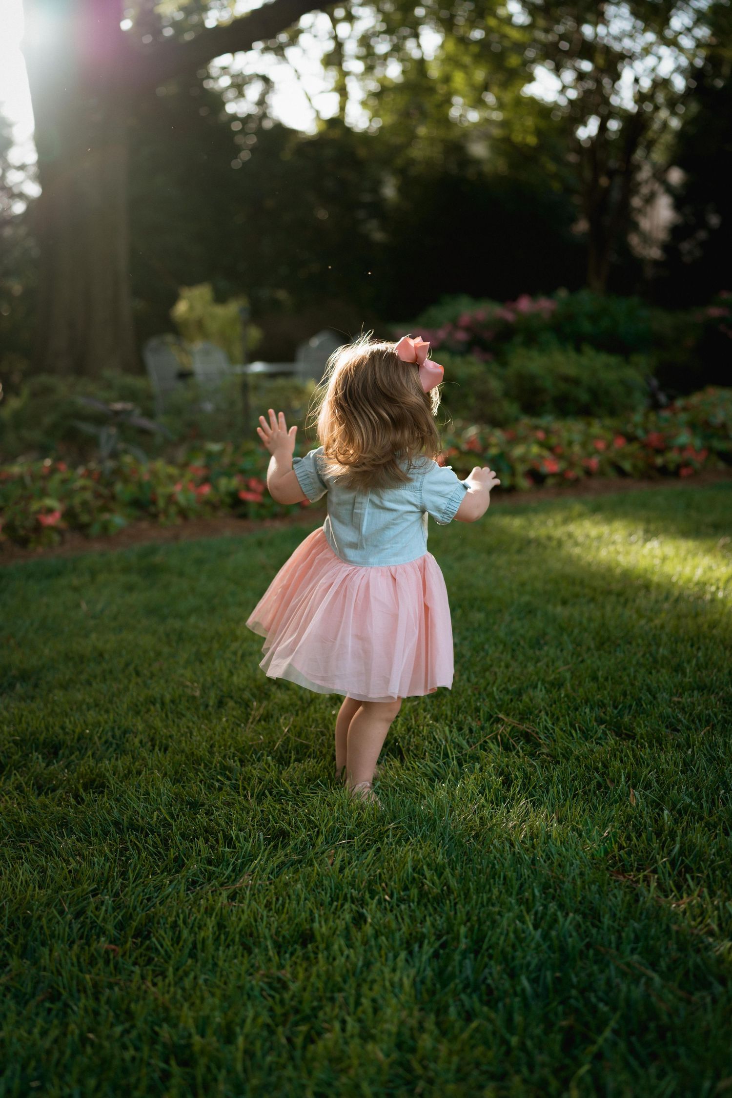 Family portrait session with teen, toddler, and mom at WRAL Azalea Garden Raleigh NC