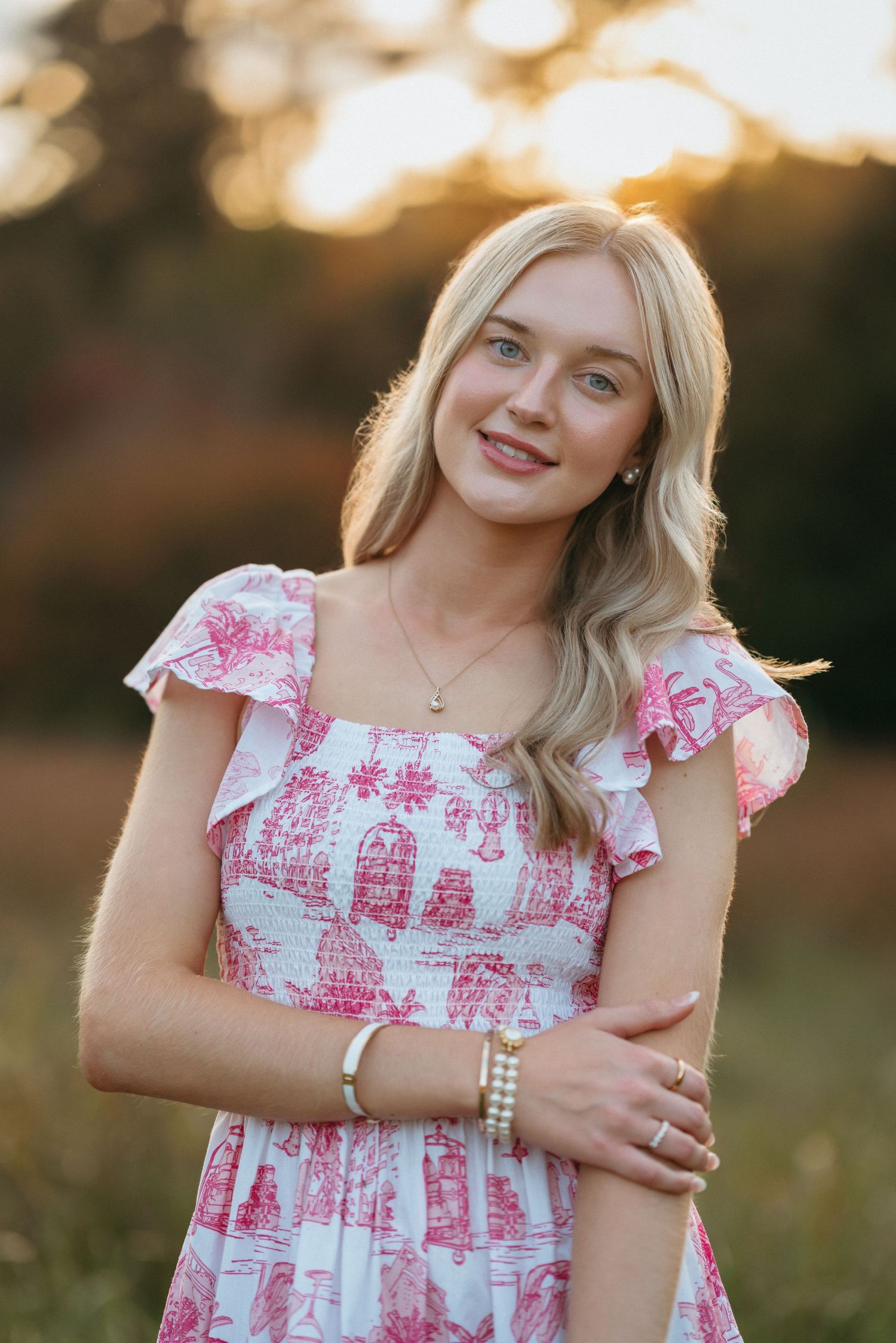 Close-up of a high school senior girl at Historic Yates Mill County Park in Raleigh.