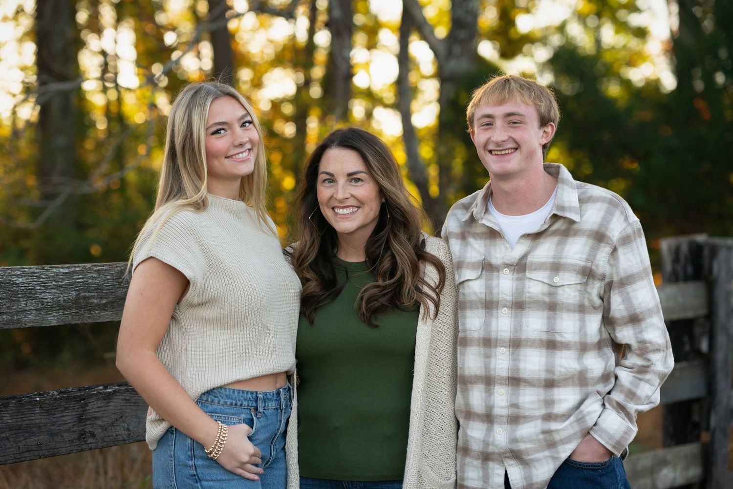 Family portrait session outdoors at Sugg Farm in Holly Springs NC