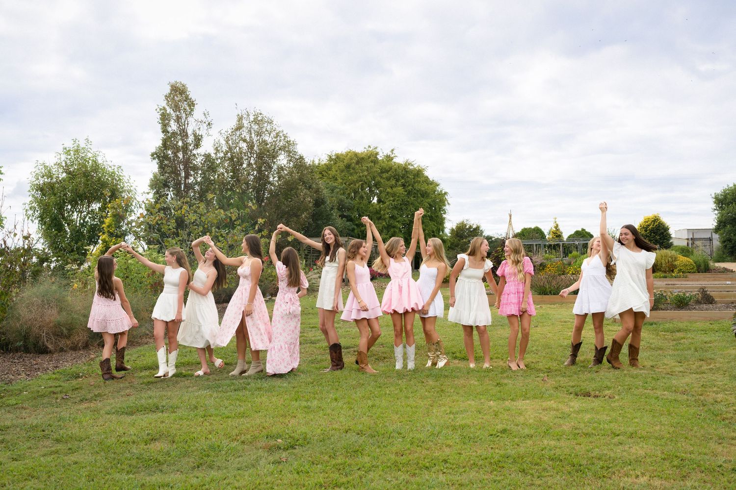 Teen girls holding hands during a birthday session
