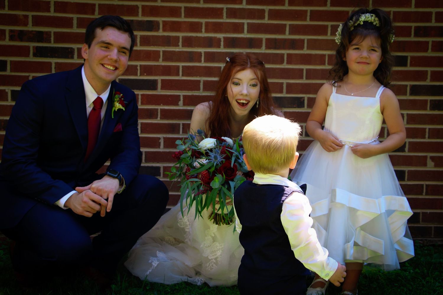 Goochland, VA Wedding- The bride and groom with the flower girl and ring bearer.
