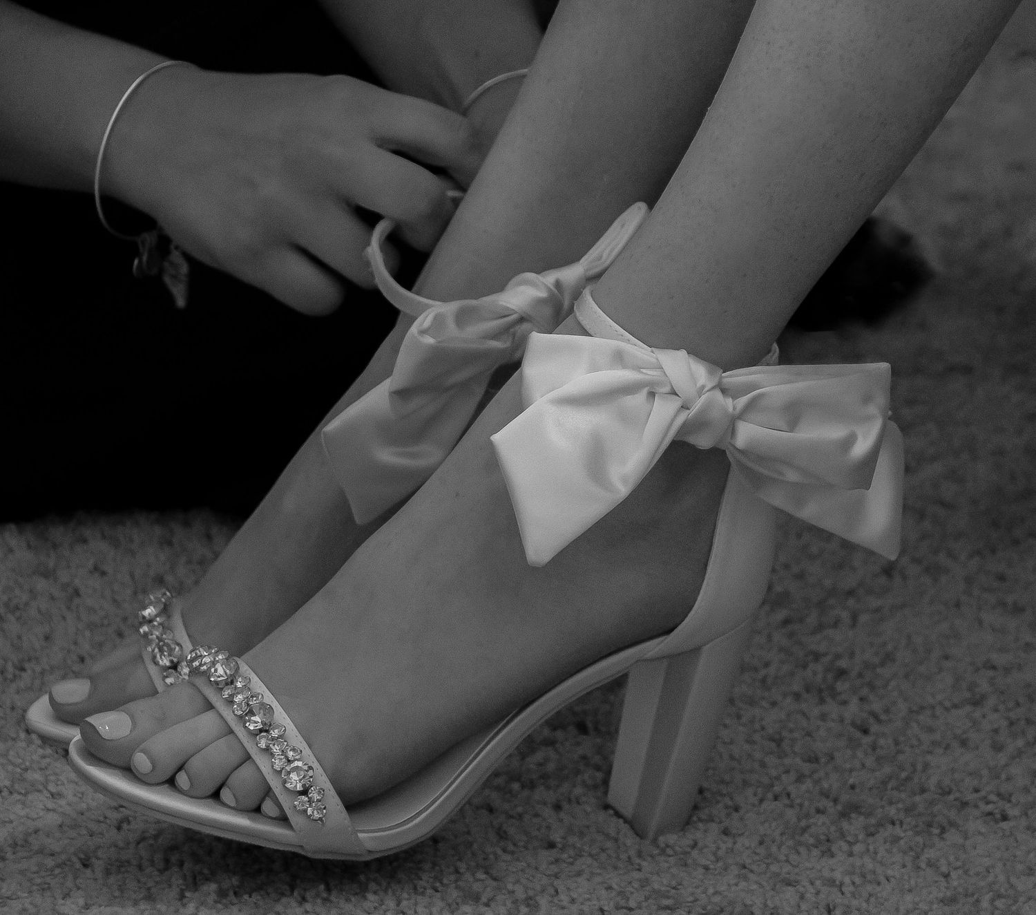 Goochland, VA Wedding- The bride getting her shoes put on.