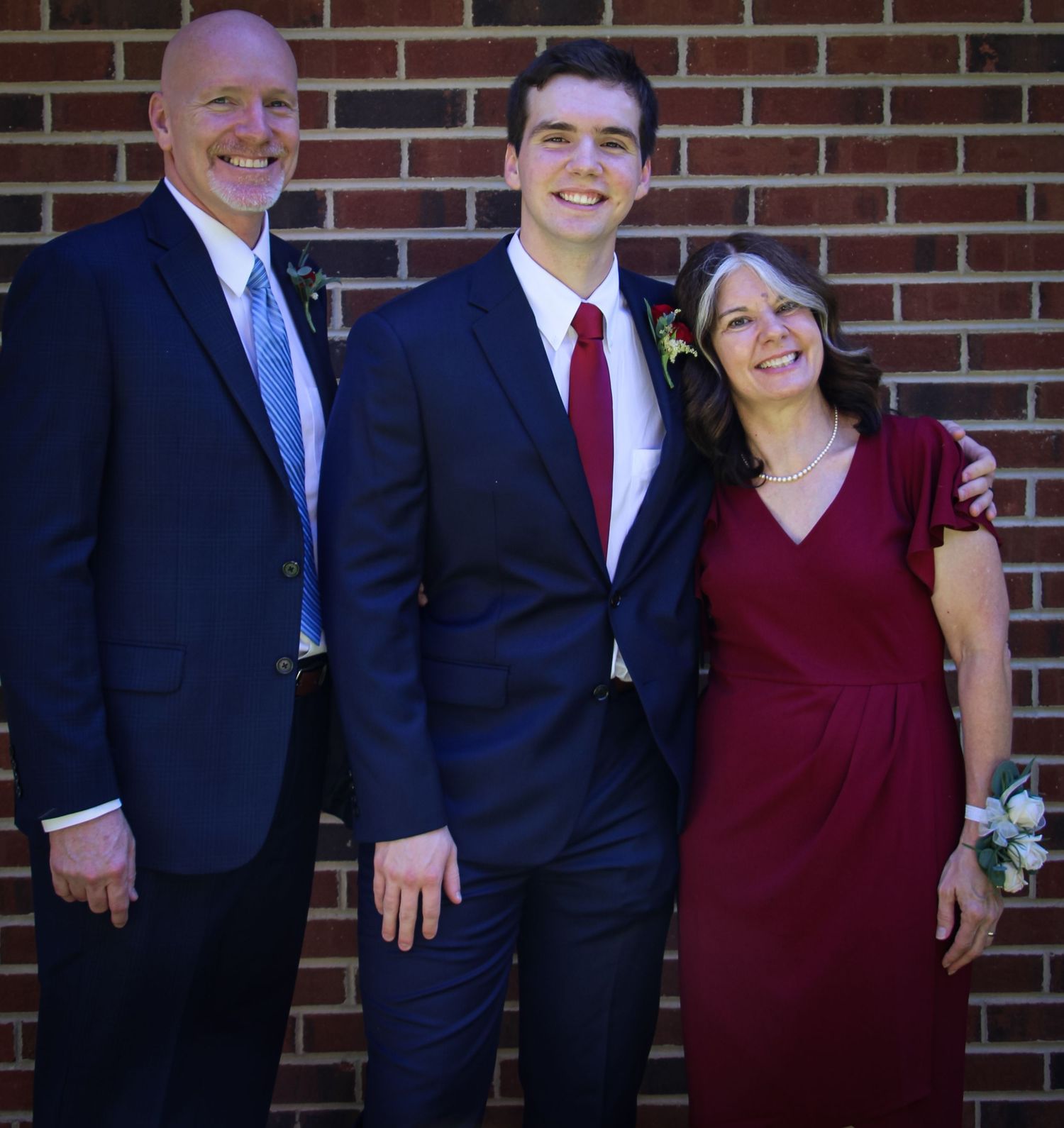 Goochland, VA Wedding- The groom and his parents.