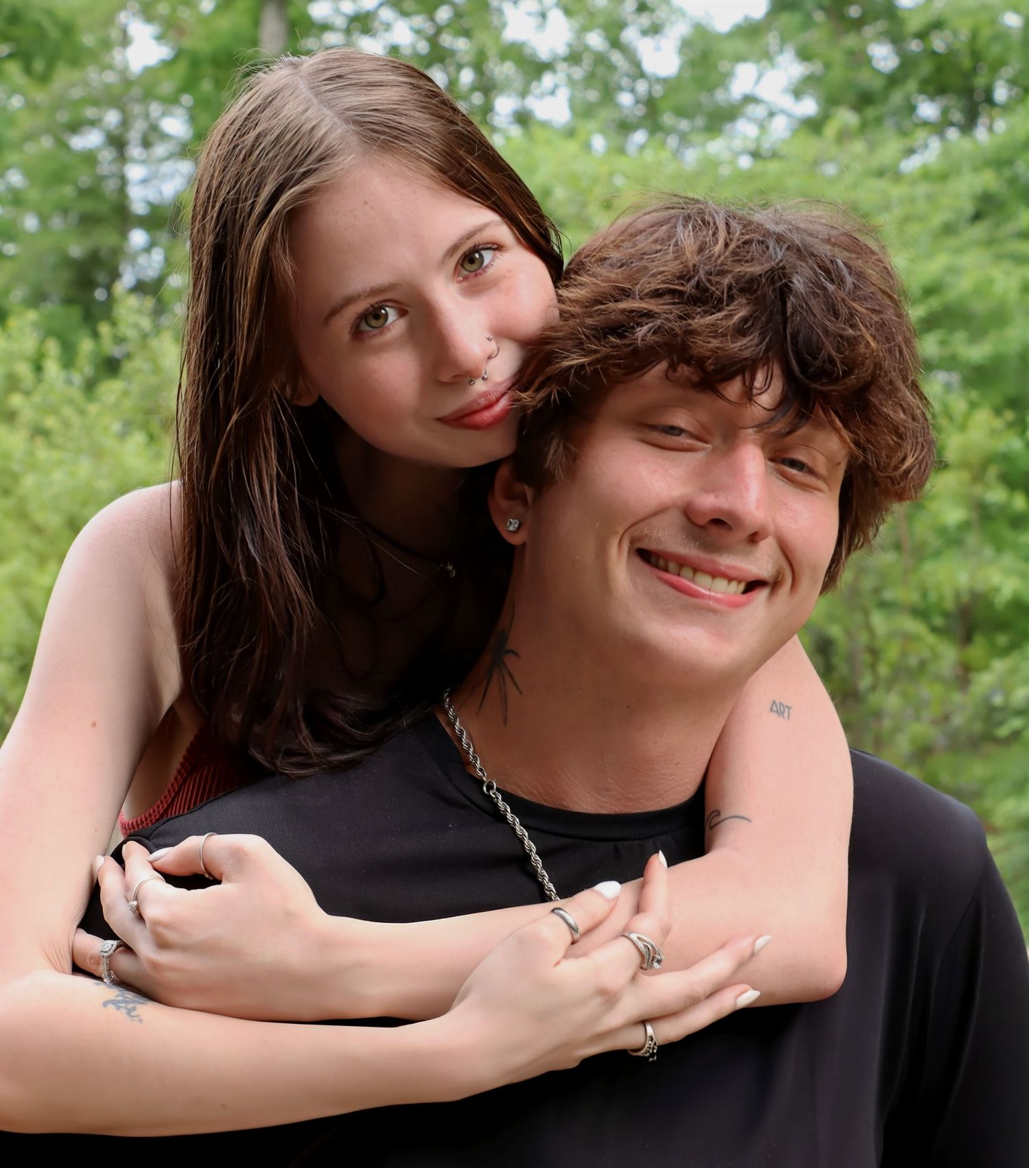 Gloucester, VA couple- Woman hugging man from behind