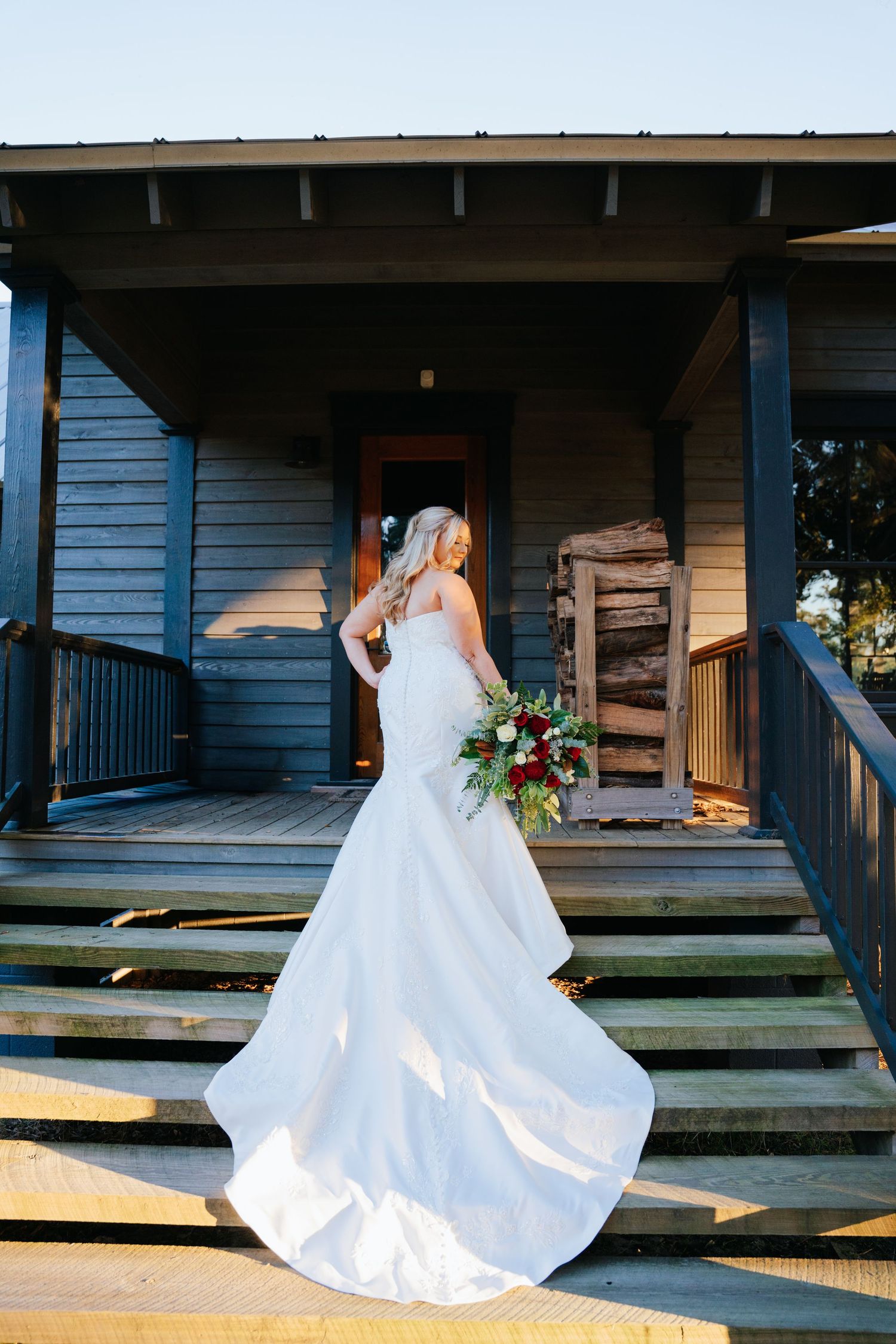 A sequence of photos showing a bride in a flowing white gown twirling on wooden porch steps in natural lighting.