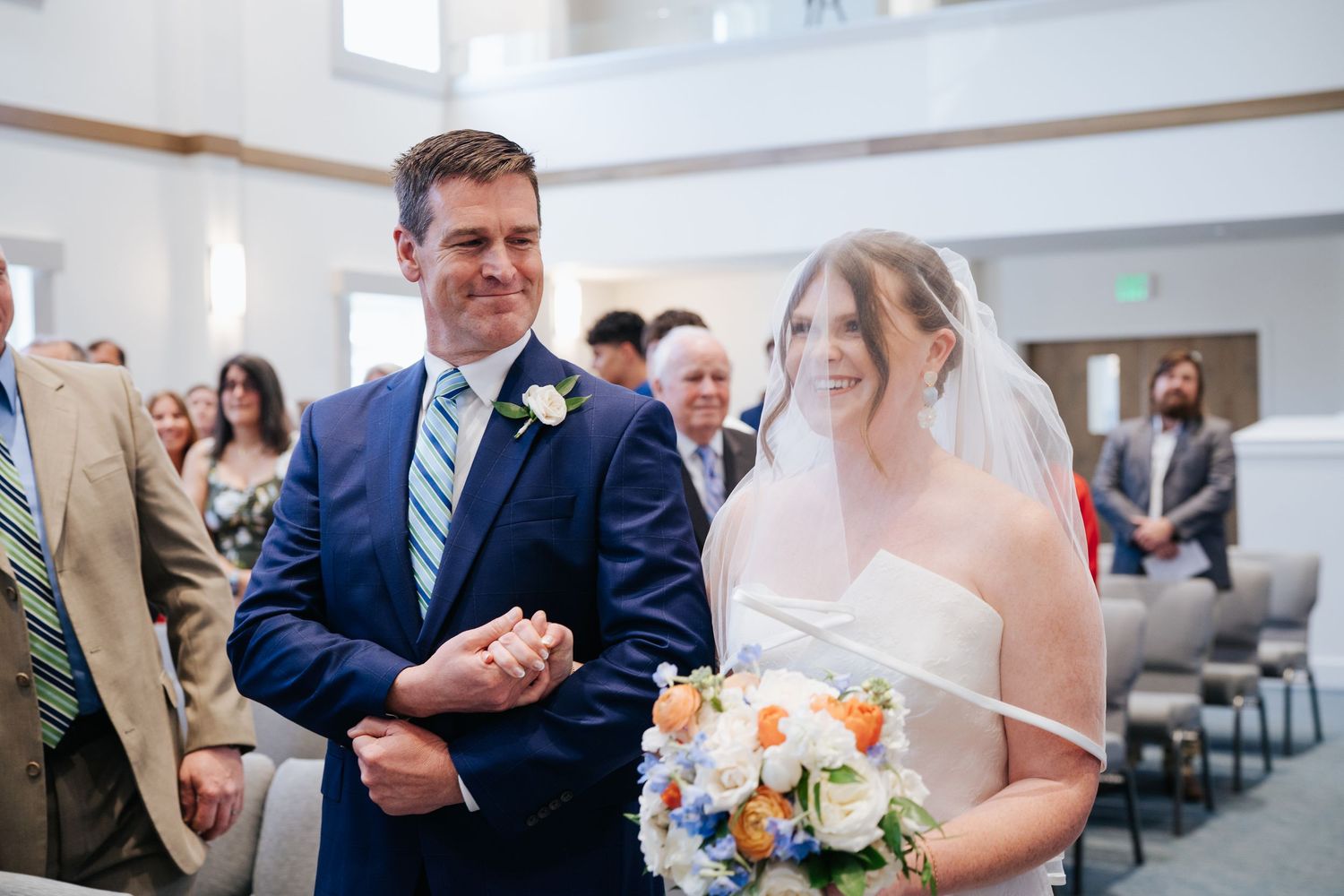 Wedding ceremony moments captured in a bright church setting.
