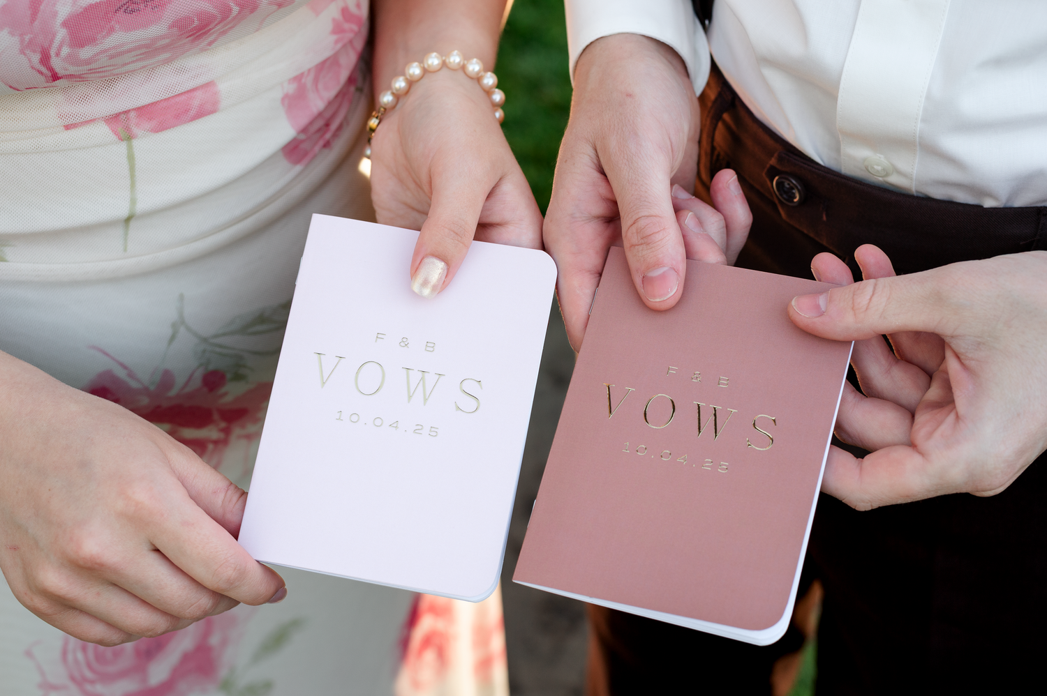 Close-up shots of pink and white wedding stationery and invitation details.