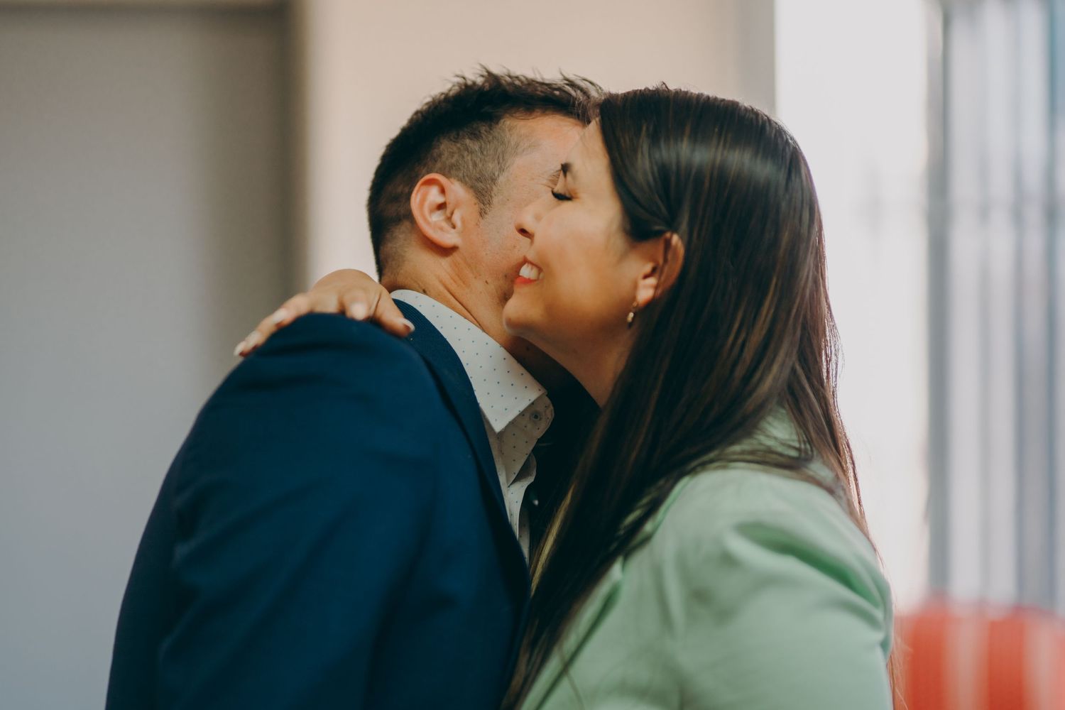 Three romantic couples share intimate kisses in a collage of indoor scenes.