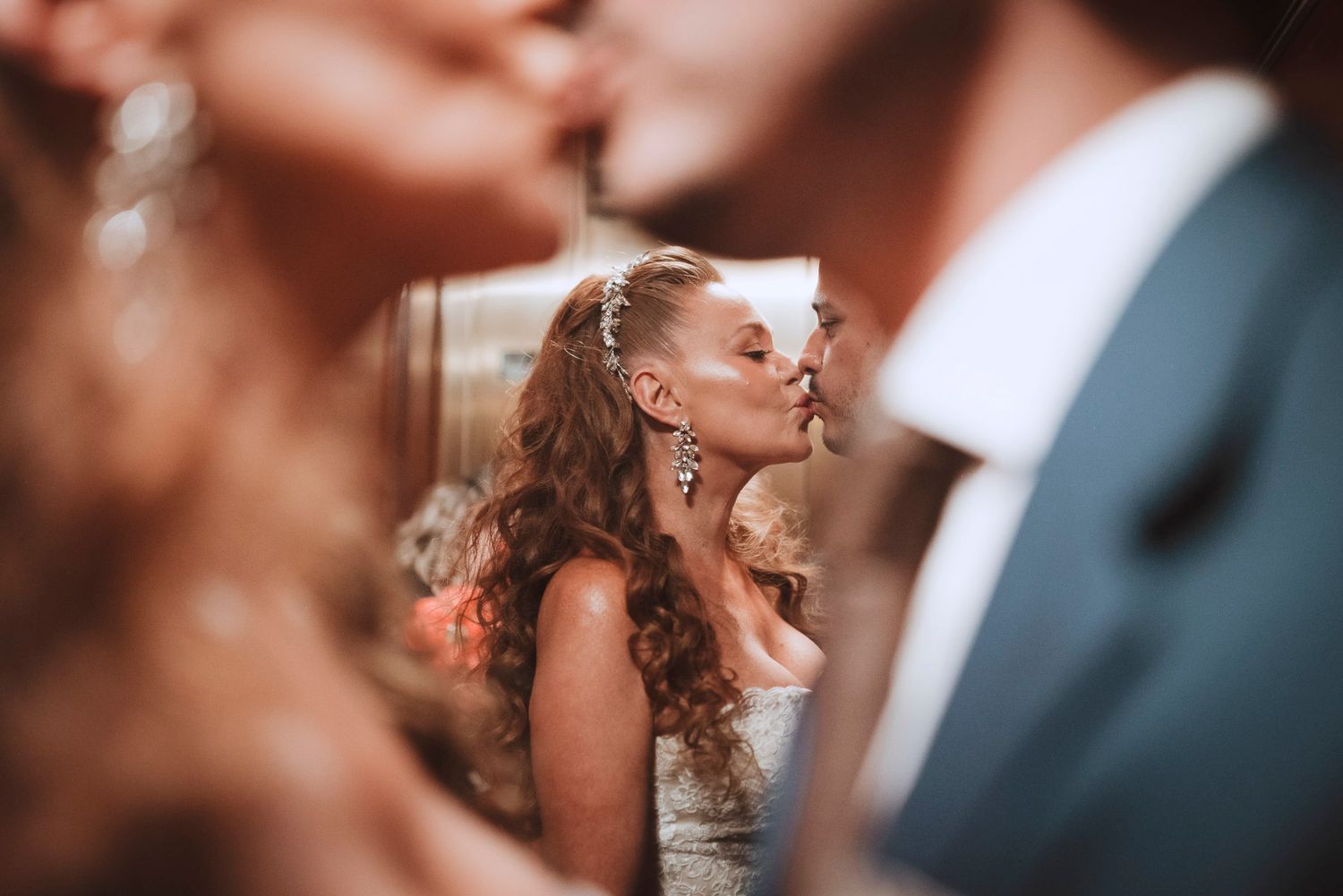 A romantic moment captured during an elegant wedding celebration.
