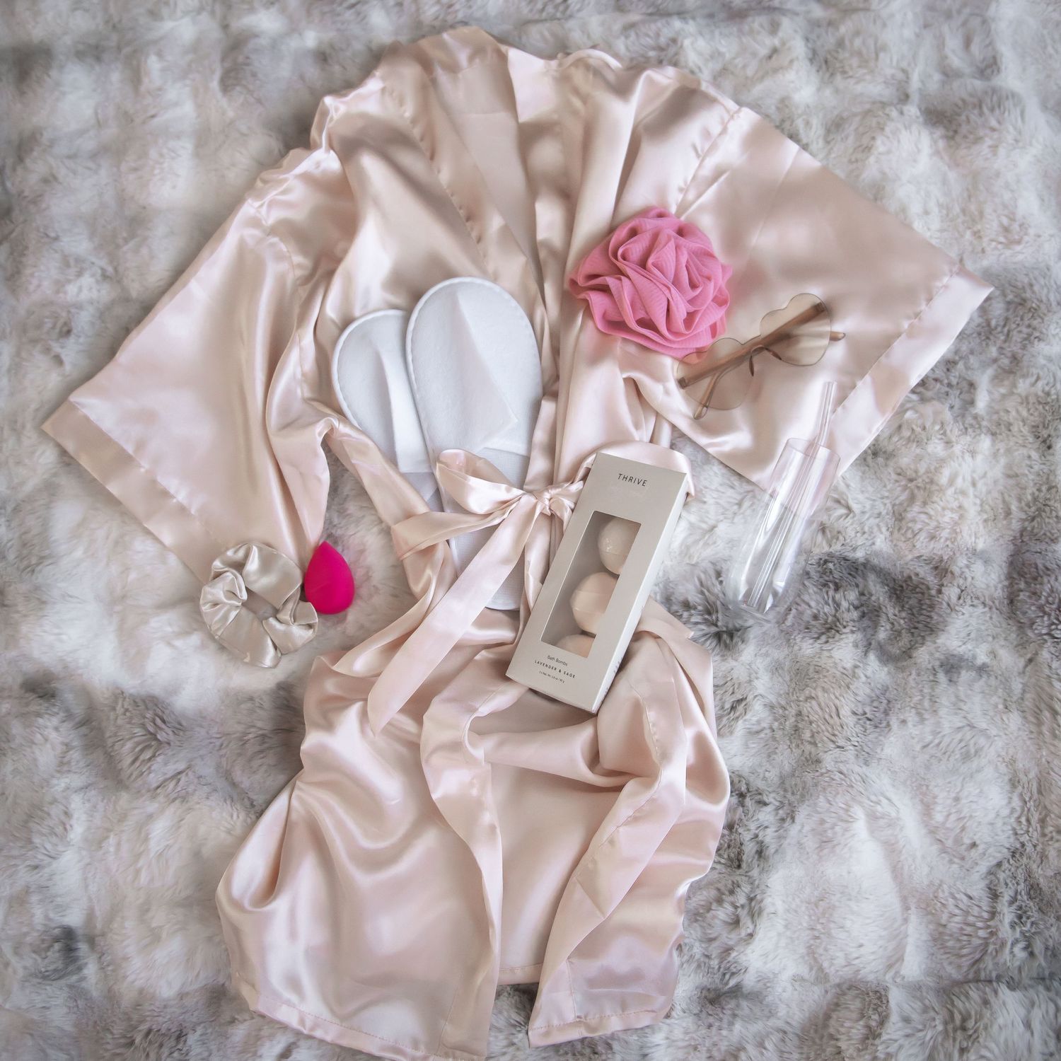 Boudoir client good basket contents including robe and slippers for use during thier session, and pampering goodies for afterwards.