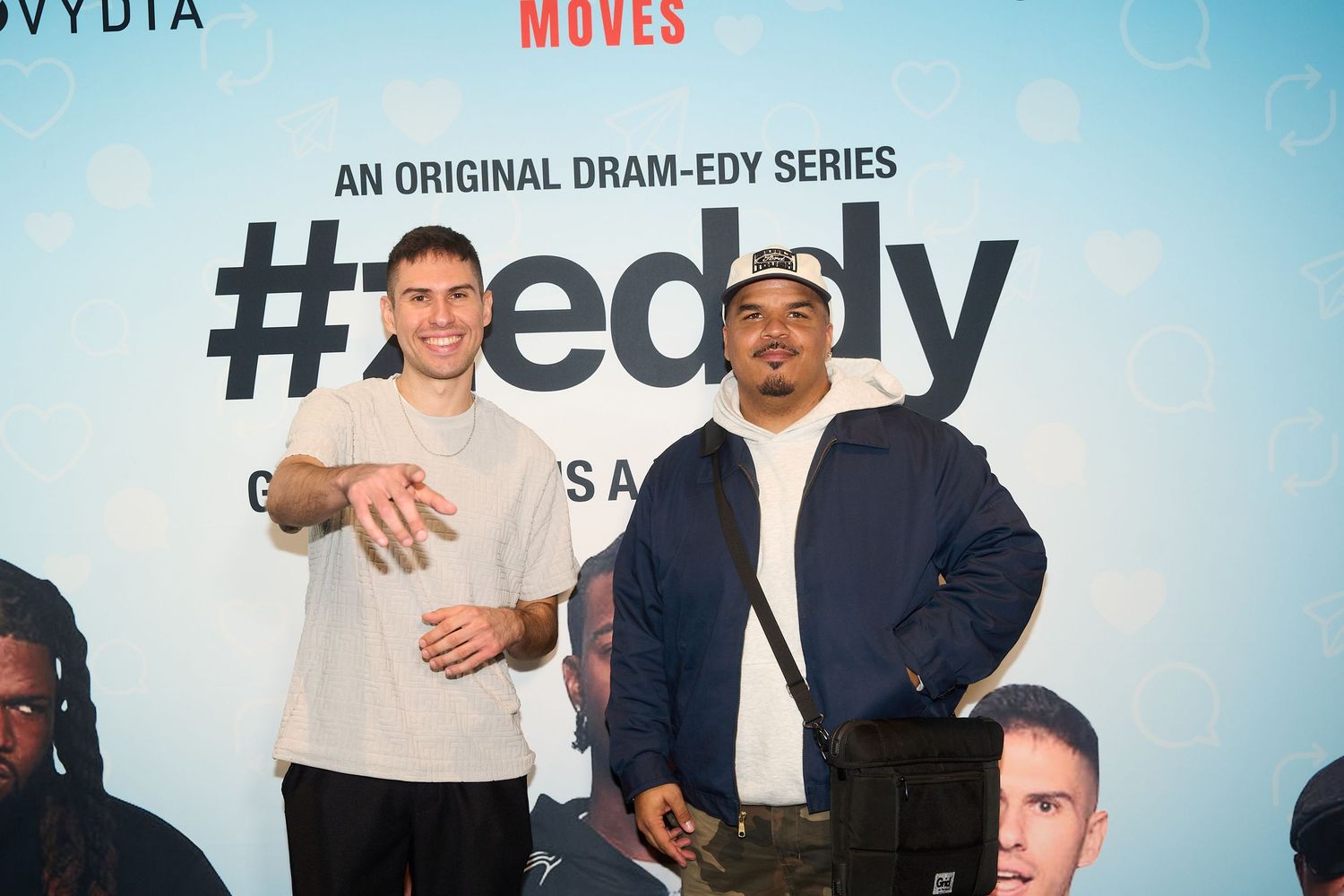 Two men posing together at a #Teddy original drama-comedy series premiere event.