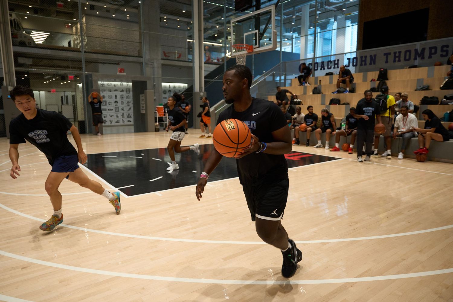 A sequence of basketball game photos showing dribbling moves and player movements on the court during gameplay.