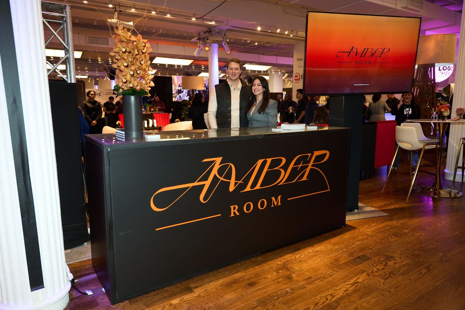 Amber Room event space with mood lighting and decorative elements for a special occasion.